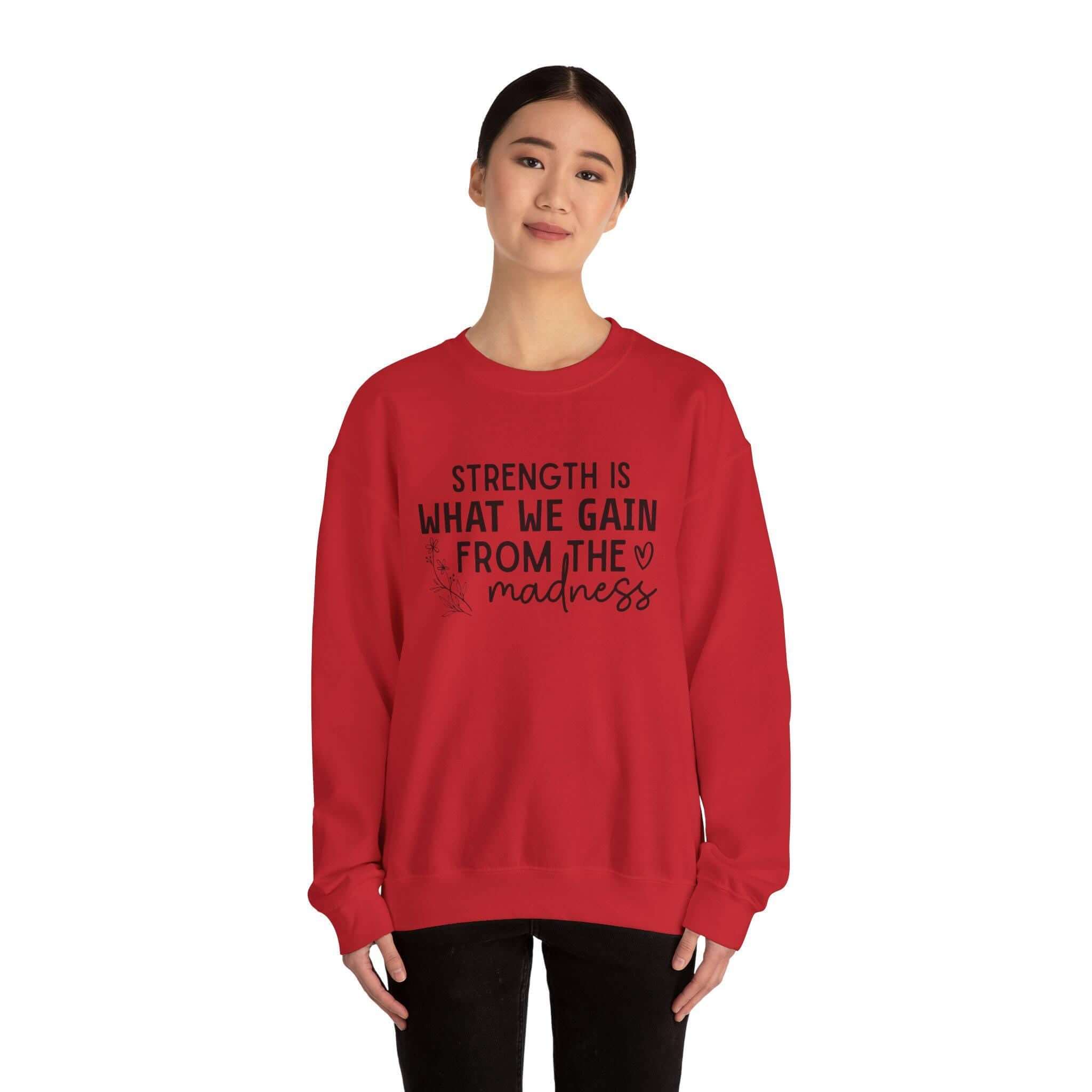 Cozy Fleece Unisex Sweatshirt - Strength Is What We Gain From Madness