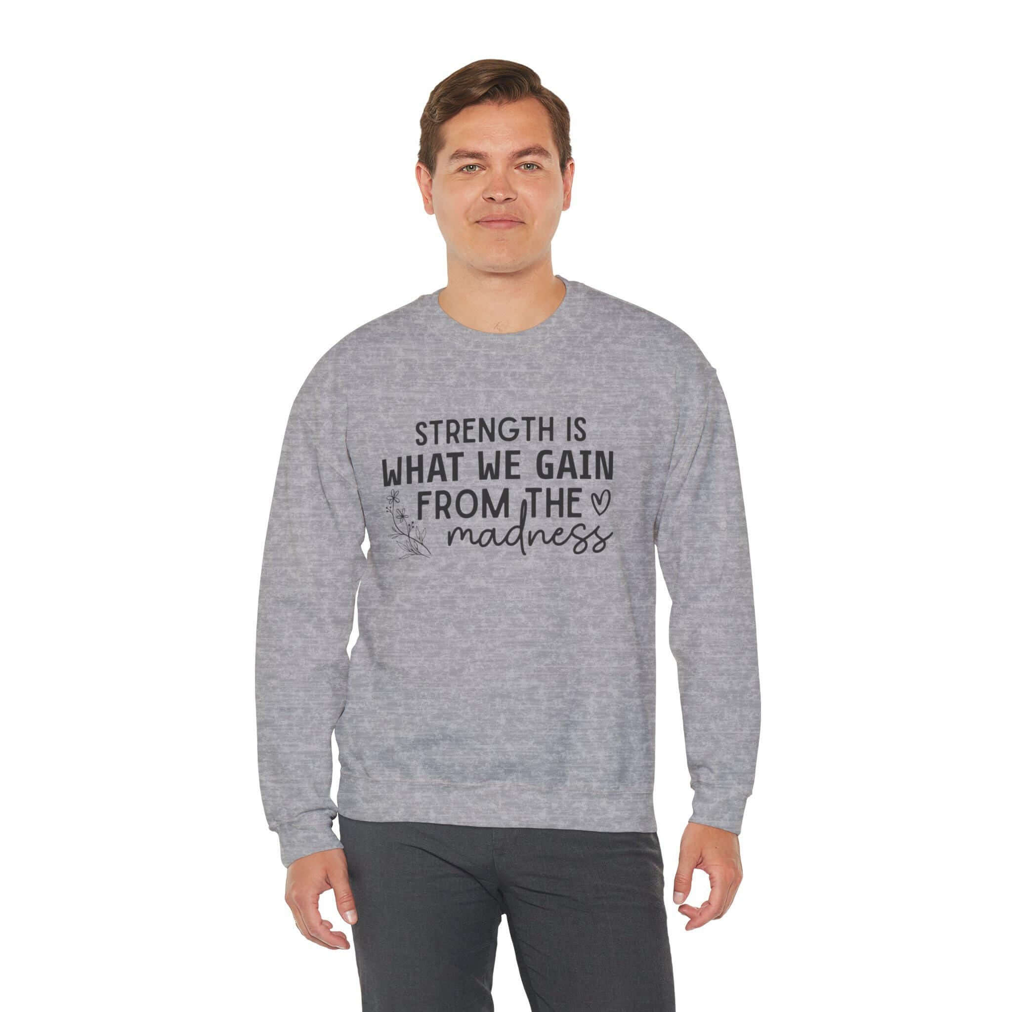 Cozy Fleece Unisex Sweatshirt - Strength Is What We Gain From Madness