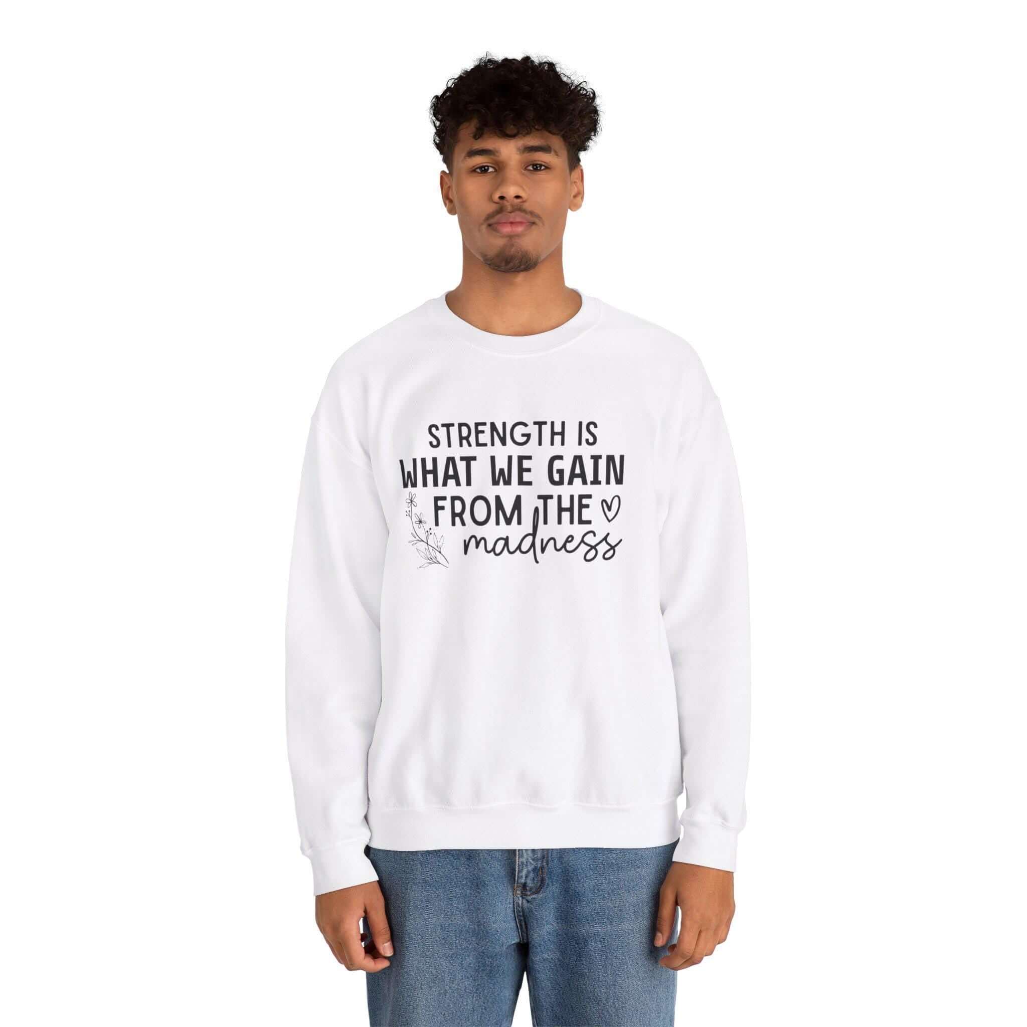 Cozy Fleece Unisex Sweatshirt - Strength Is What We Gain From Madness