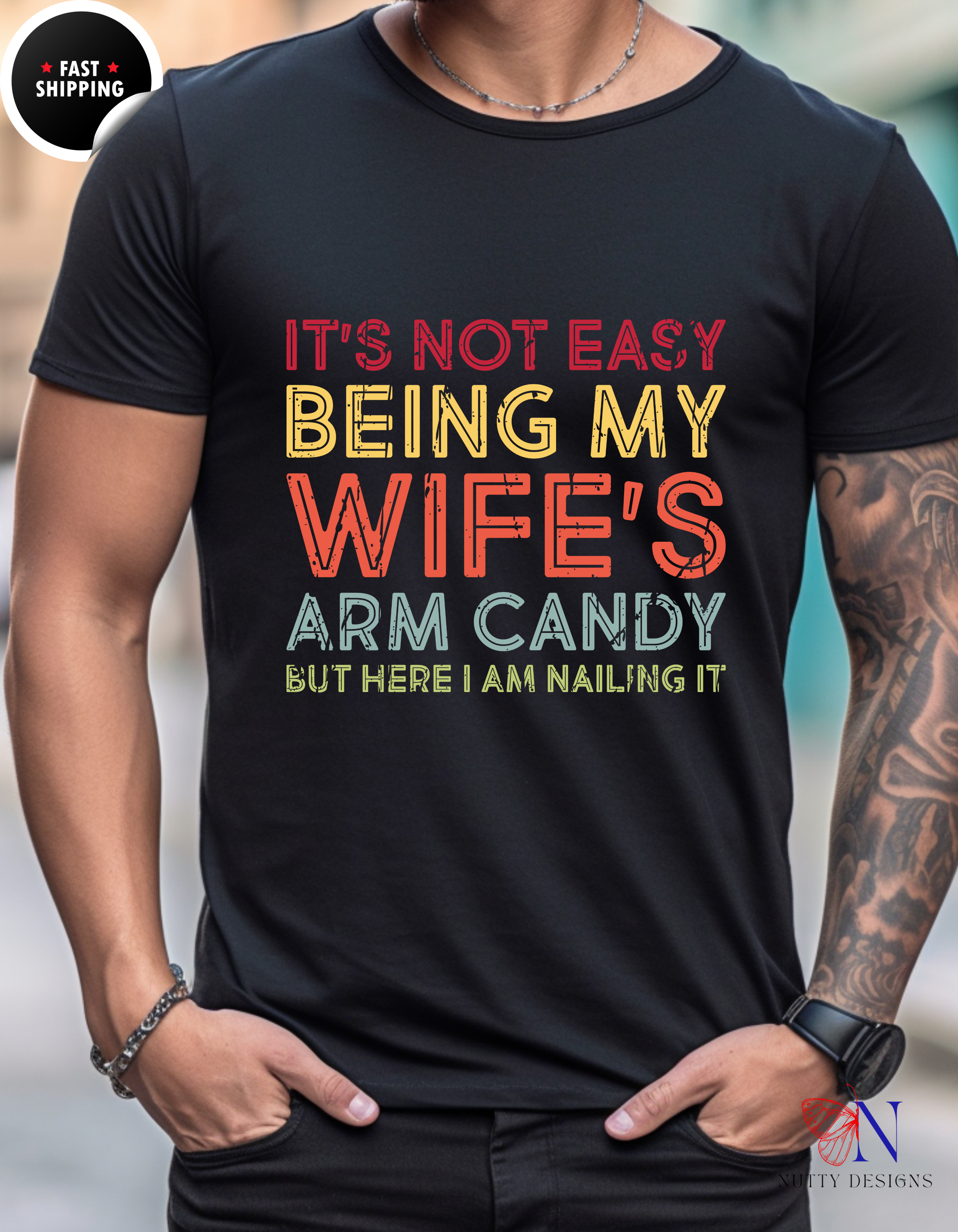 It's Not Easy Being My Wife's Arm Candy But Here I Am Nailing T-Shirt Lifestyle Mockup | Nutty Designs