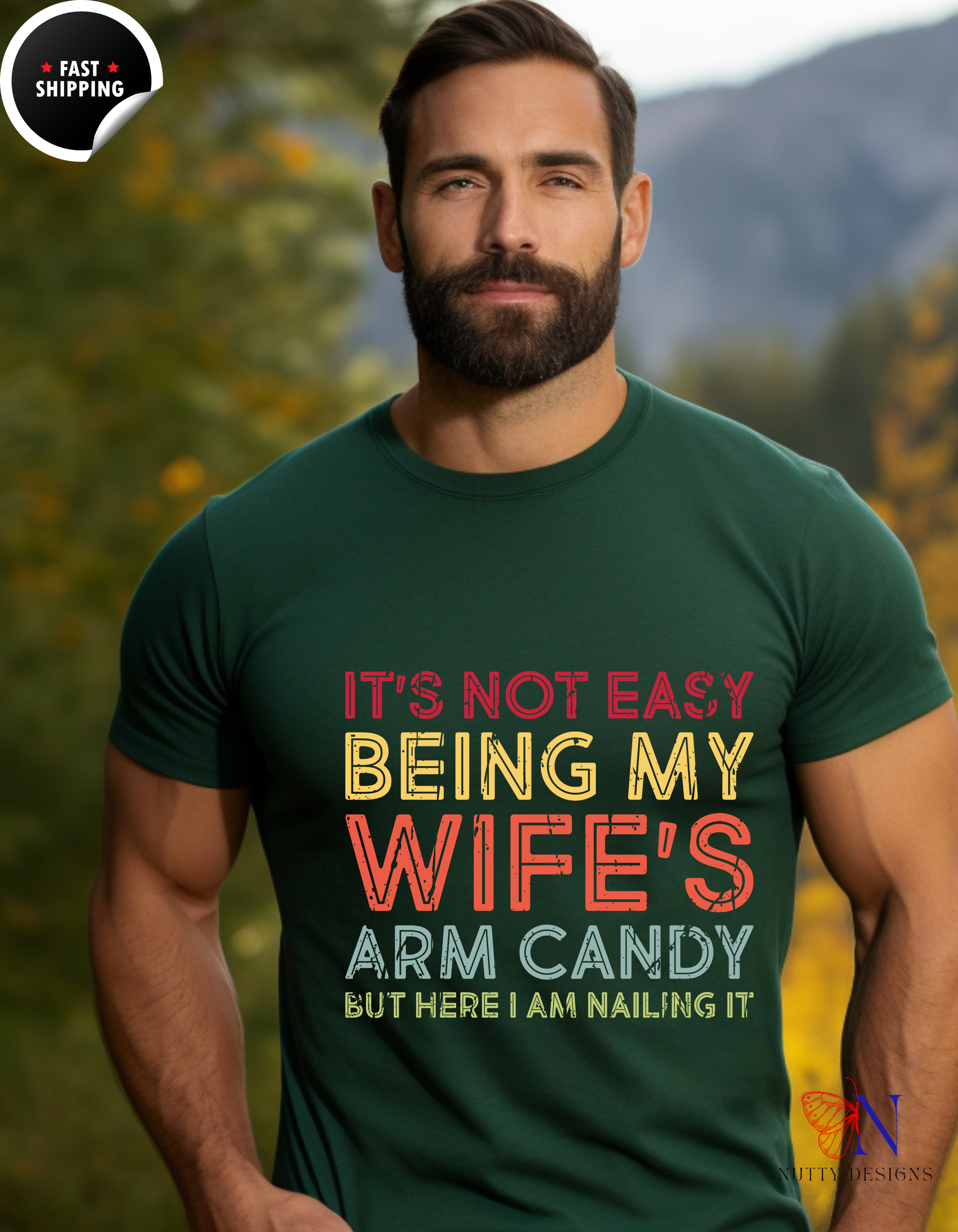It's Not Easy Being My Wife's Arm Candy But Here I Am Nailing T-Shirt Lifestyle Mockup | Nutty Designs