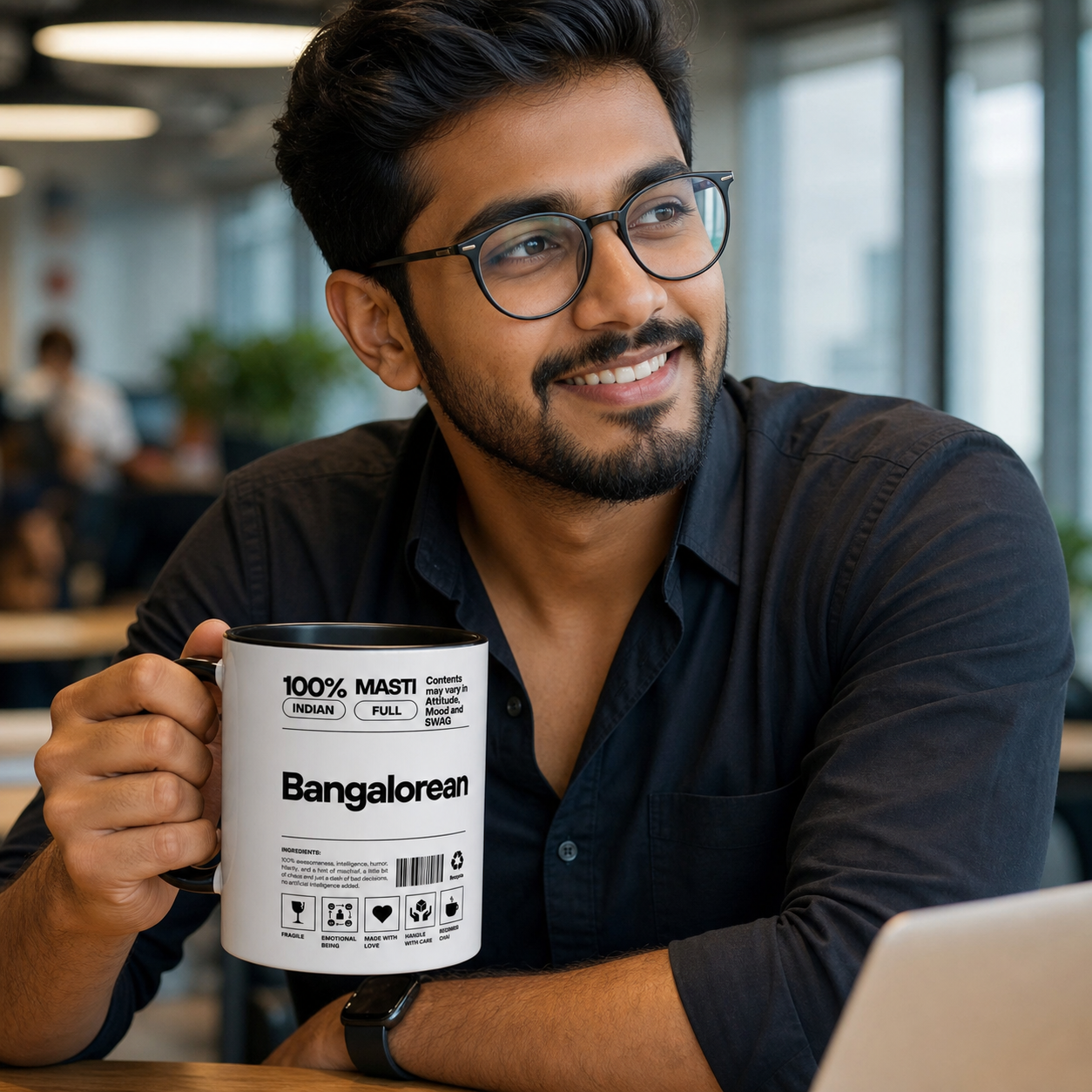 Young Bengaluru man holding black-accent Banglorean Desi Roots mug