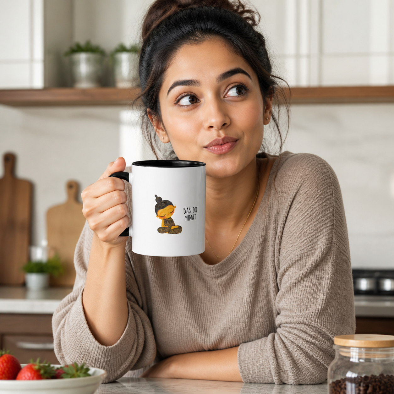 Young Indian woman holding black-accent Bas Do Minat mug in kitchen
