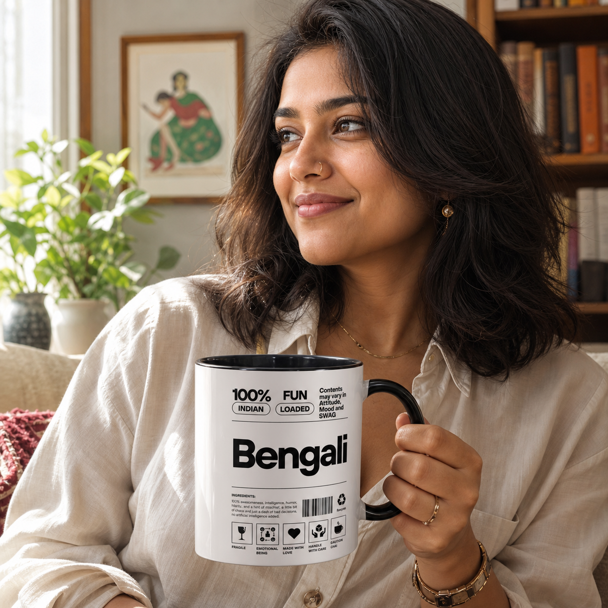Young Bengali woman holding black-accent Bengali Desi Roots mug
