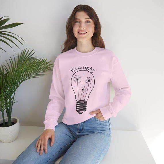 Be a Light Sweatshirt | Inspirational Quote Pullover | Cozy Casual Wear for Women | Perfect Gift for Friends & Family