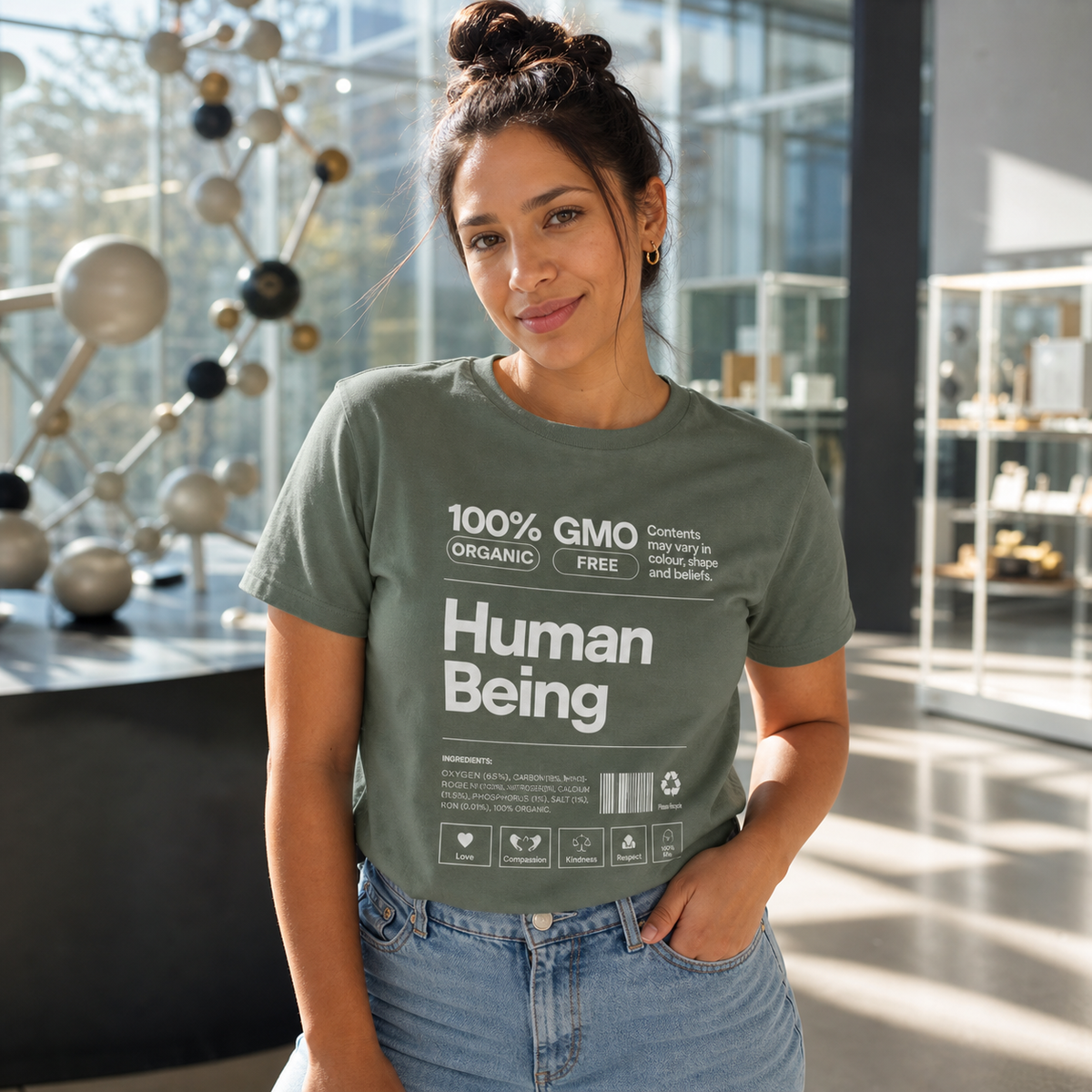 Woman wearing Human Being facts graphic T-shirt in a modern science museum — alternate clean view