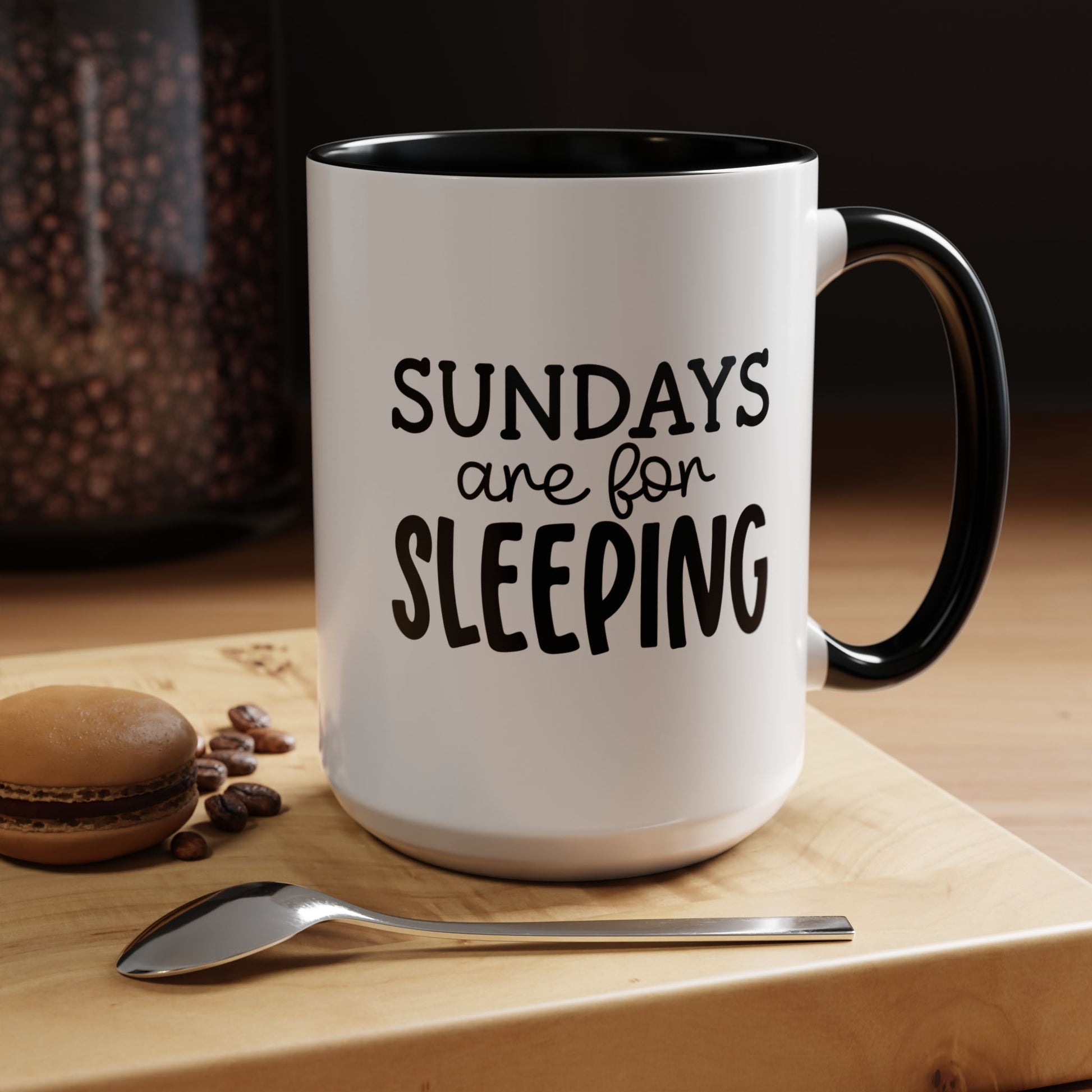 funny coffee mug gift Sundays Are For Sleeping with spoon and macaron on table