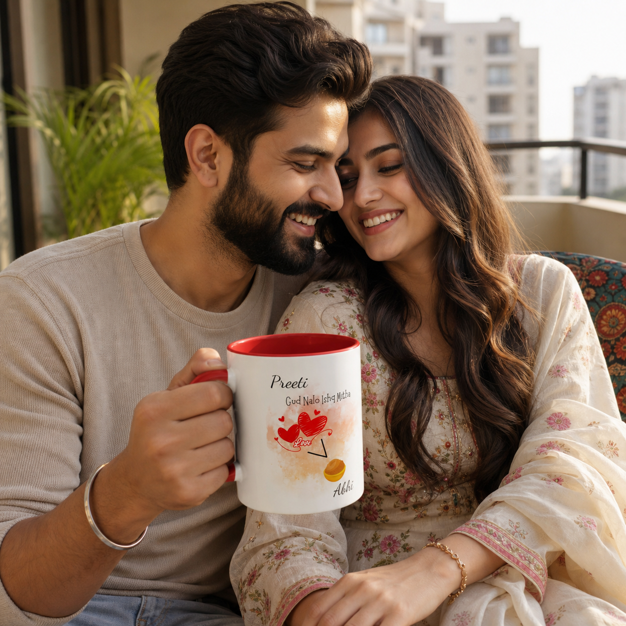 Young Punjabi couple holding personalized red-accent Gud Nalo Ishq Mitha mug