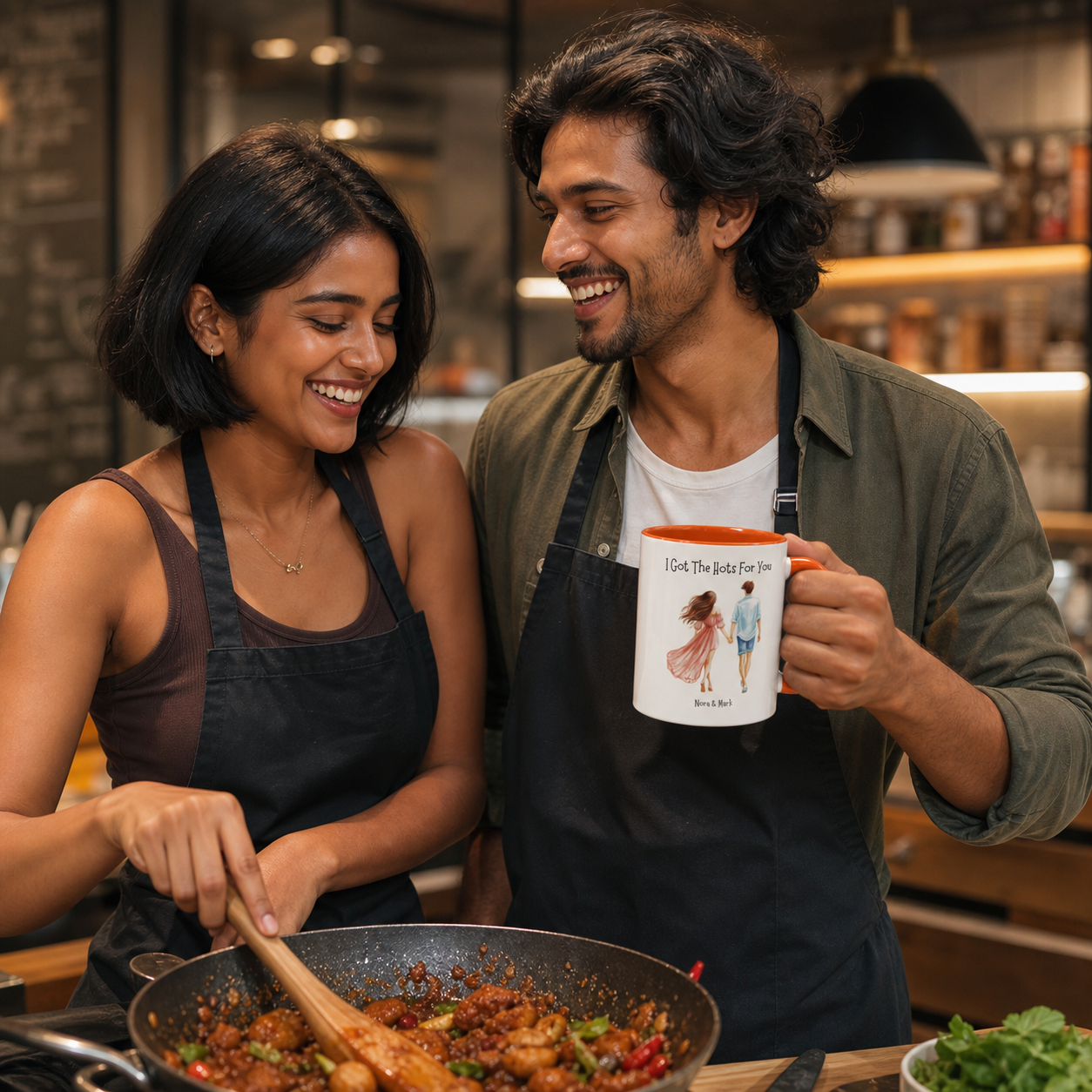 Young couple holding personalized orange-accent I Got the Hots for You mug in a cooking class