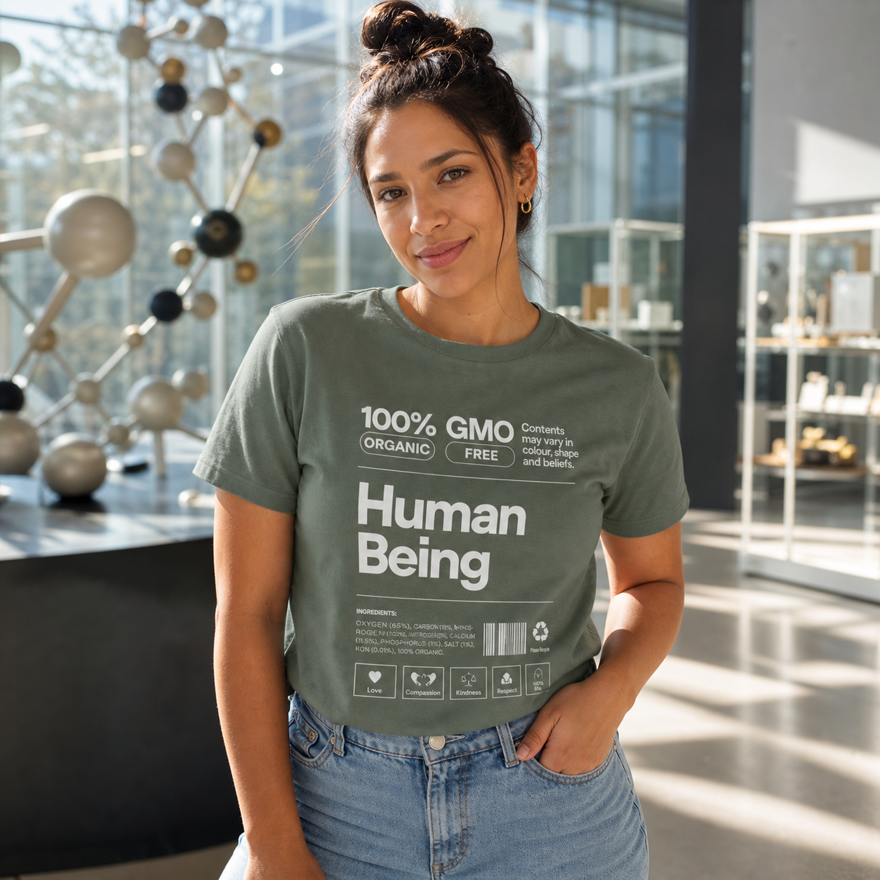 Woman wearing Human Being facts graphic T-shirt in a modern science museum