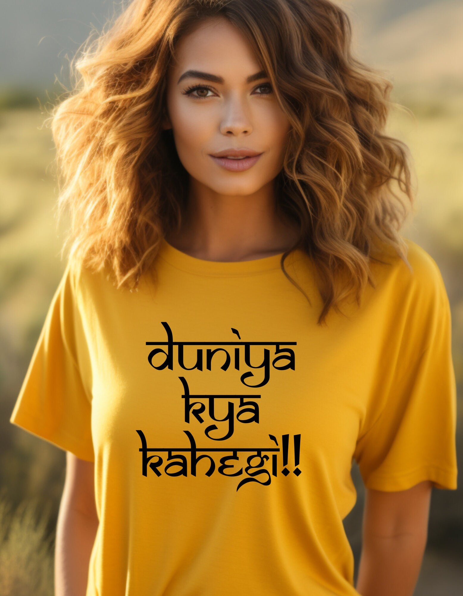 a woman wearing a yellow t - shirt with the words buddha on it