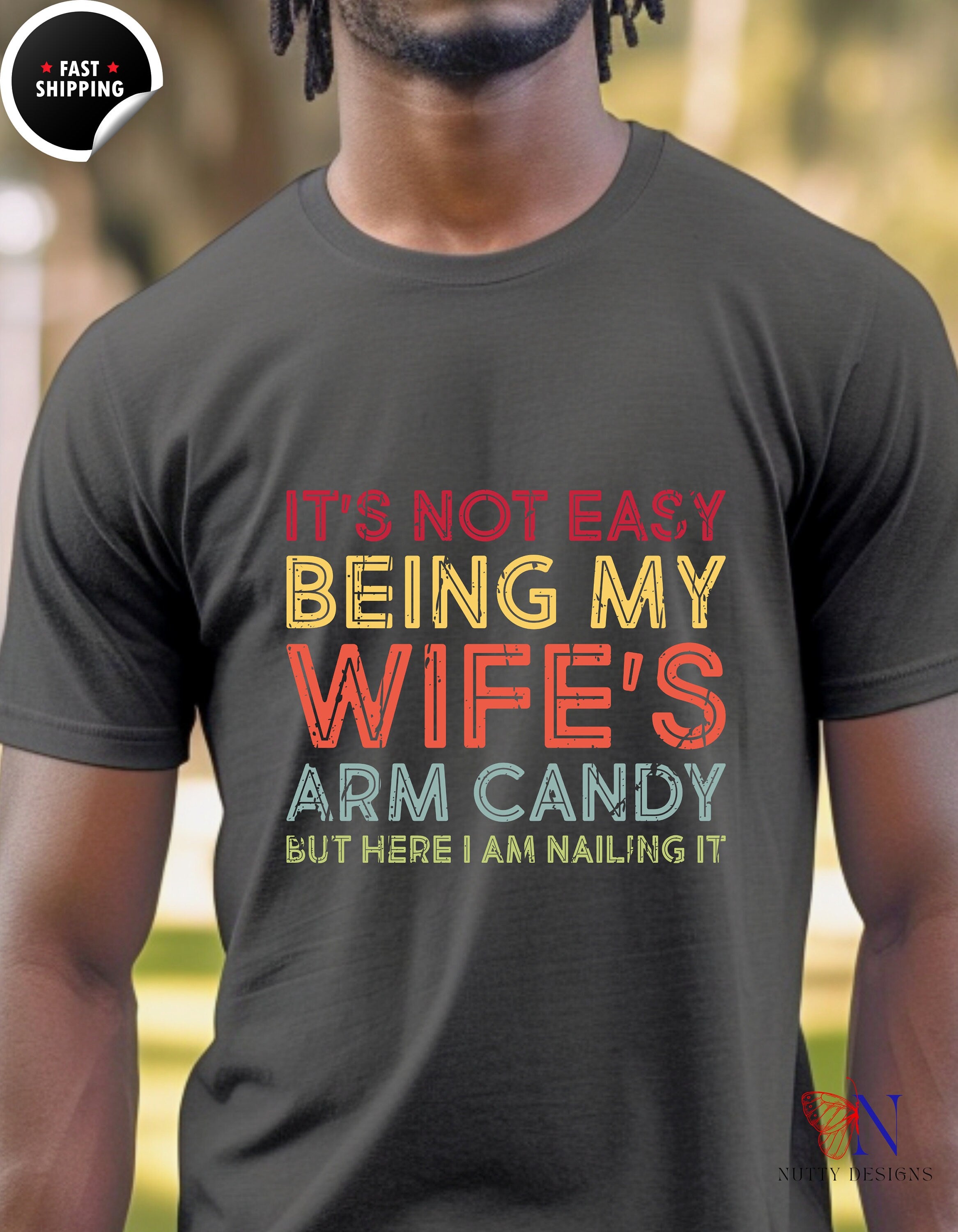 It's Not Easy Being My Wife's Arm Candy But Here I Am Nailing It, tshirt gift idea Funny Unisex T-shirt, gift for him