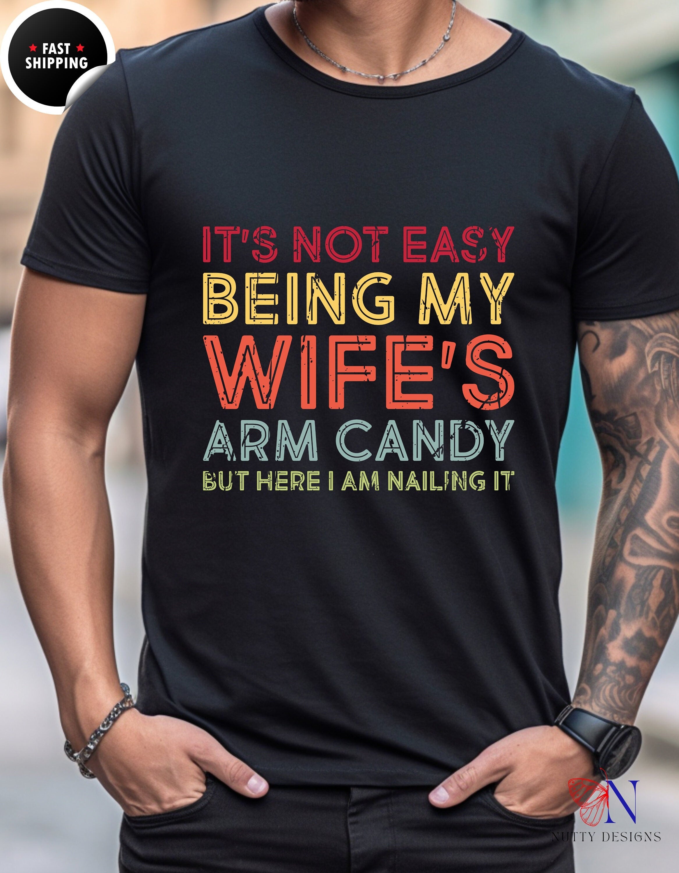 It's Not Easy Being My Wife's Arm Candy But Here I Am Nailing It, tshirt gift idea Funny Unisex T-shirt, gift for him