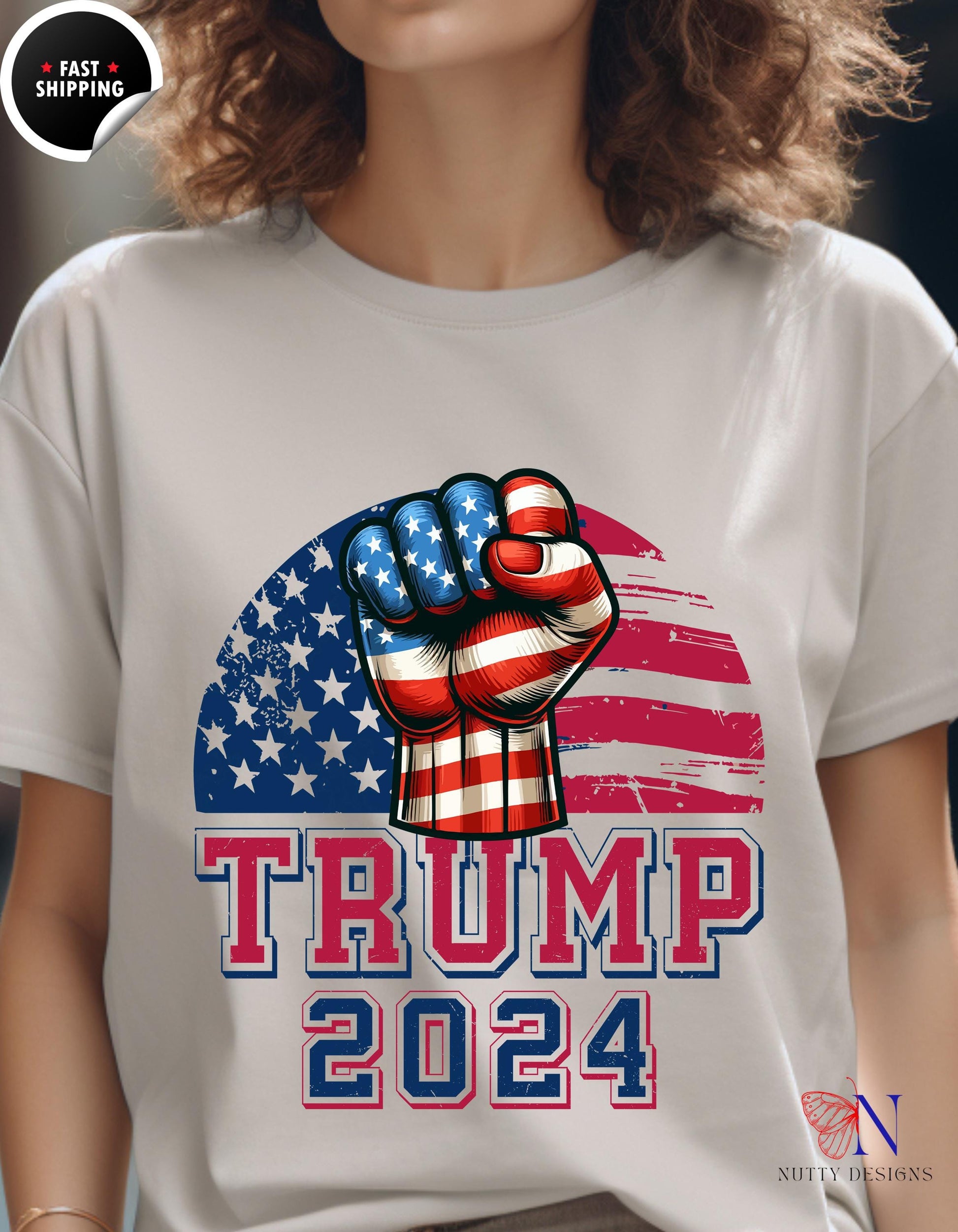 a woman wearing a white t - shirt with the american flag on it