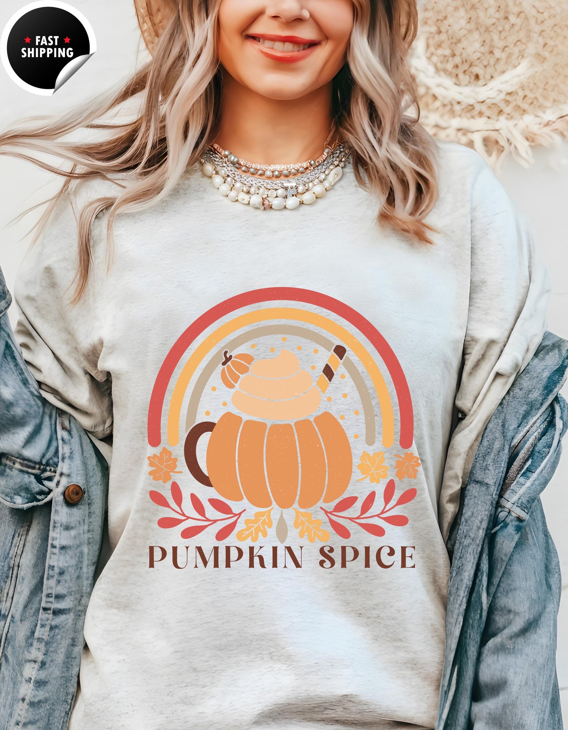 a woman wearing a pumpkin spice shirt