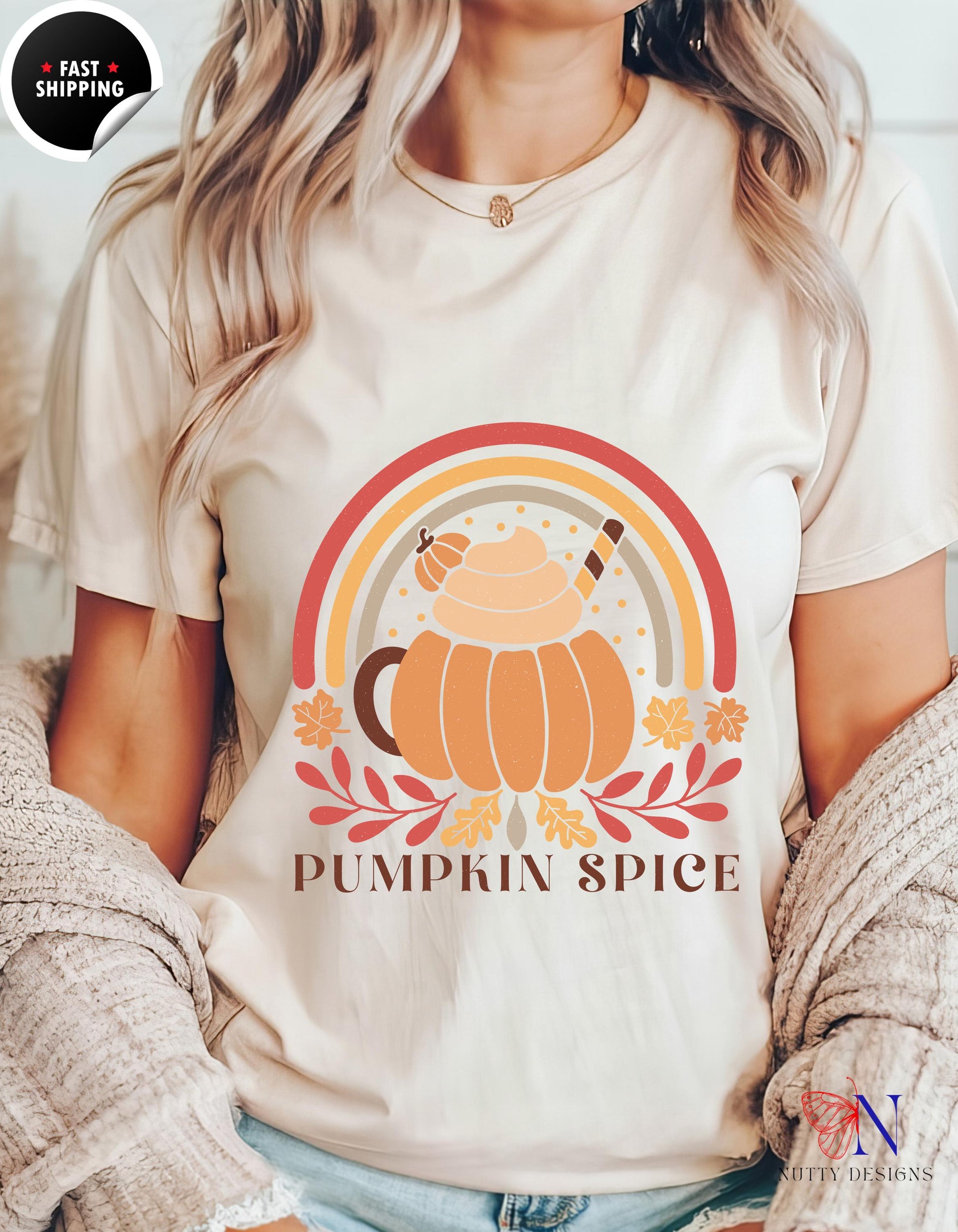 a woman wearing a pumpkin spice t - shirt