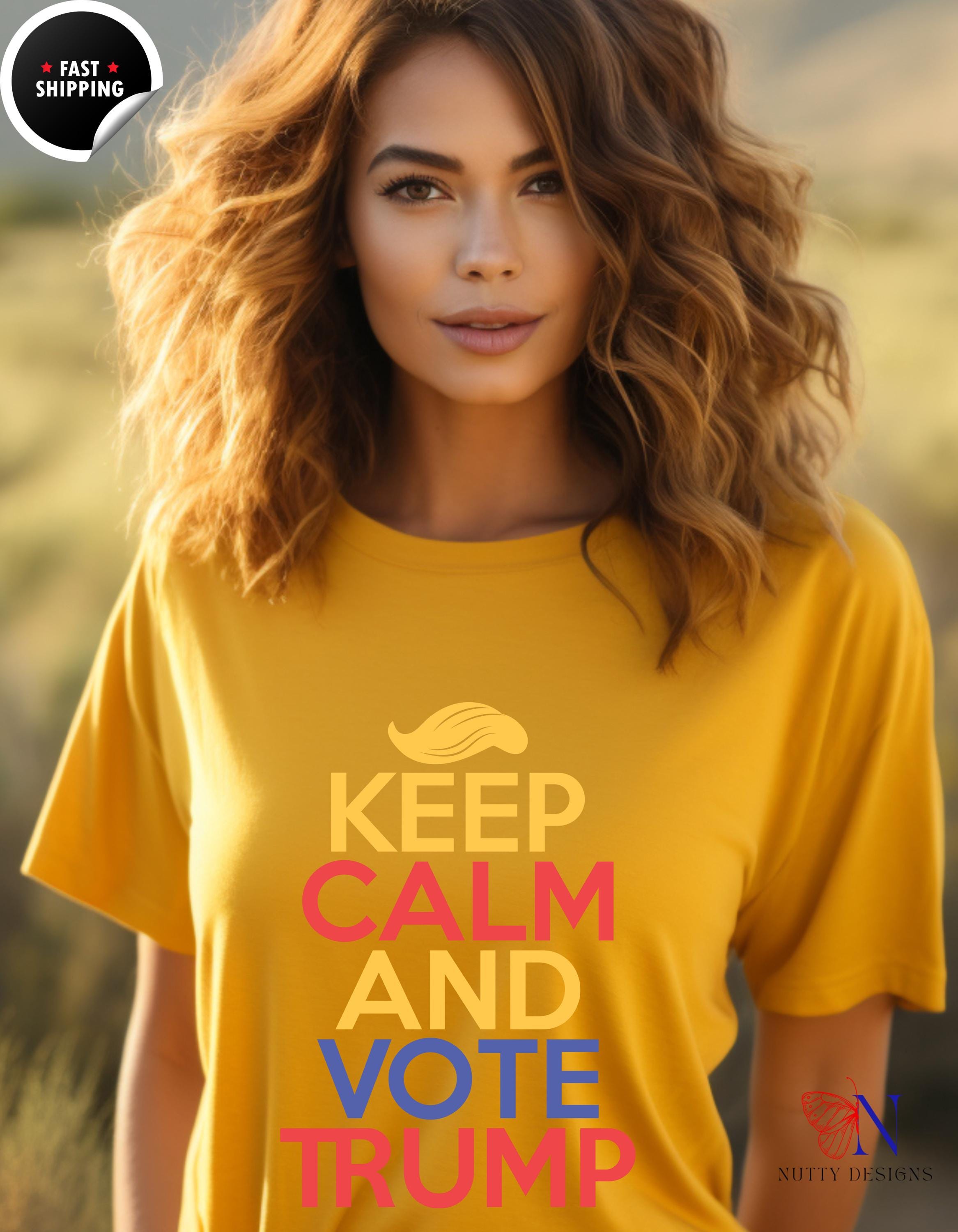 a woman wearing a yellow t - shirt that says keep calm and vote trump