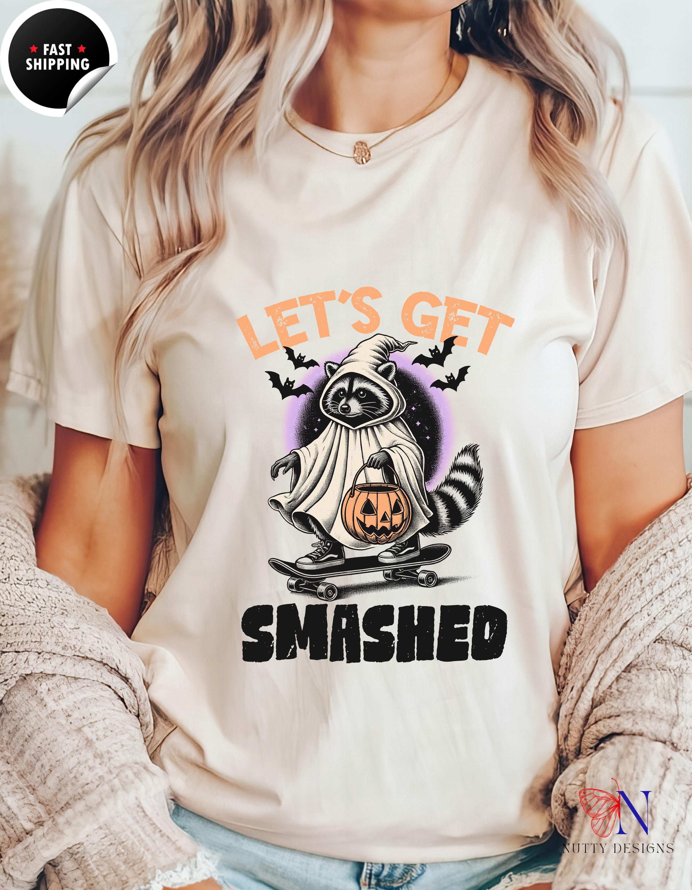 a woman wearing a white t - shirt that says let&#39;s get smashed