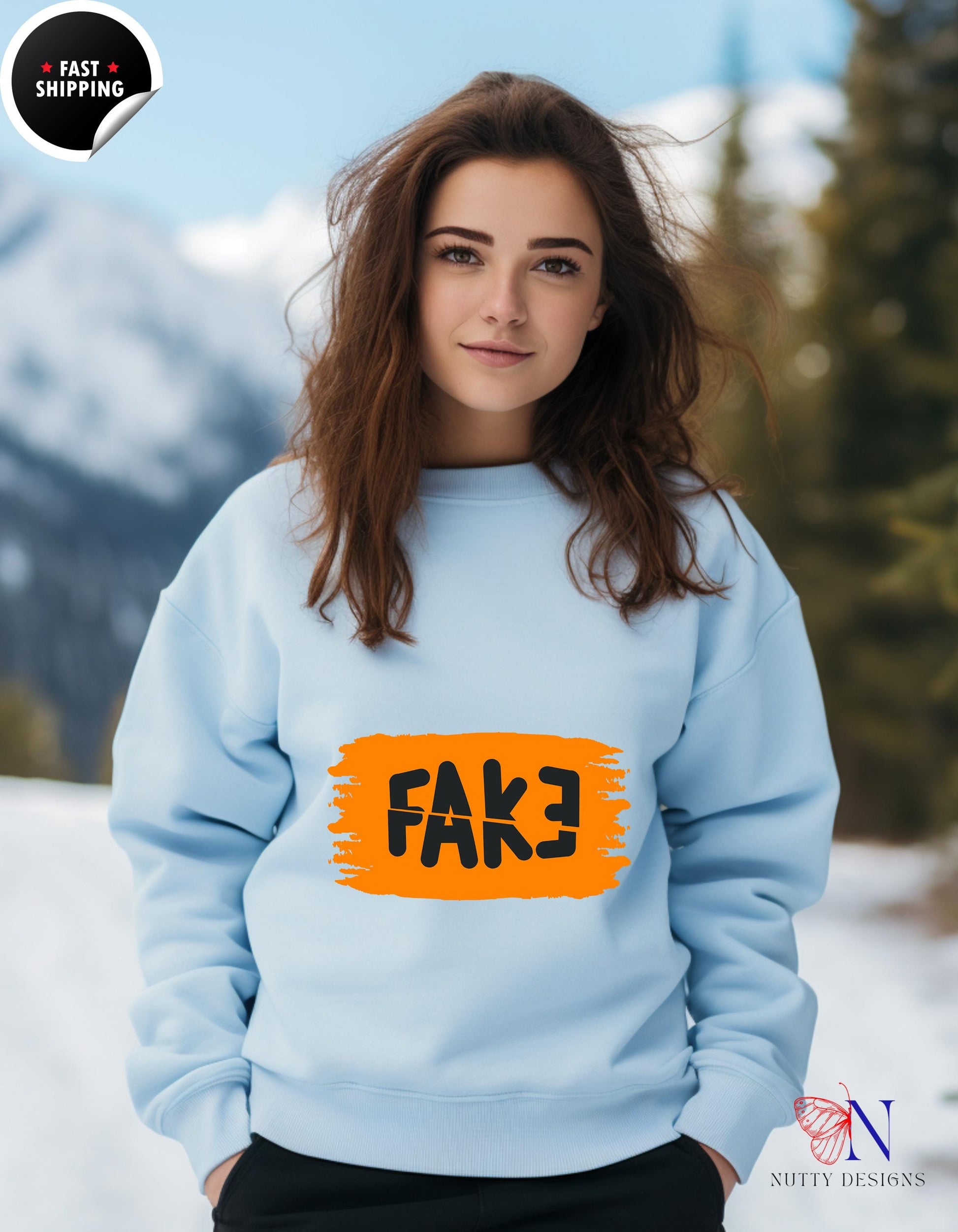 a woman wearing a blue sweatshirt with a fake fake fake fake fake fake fake fake