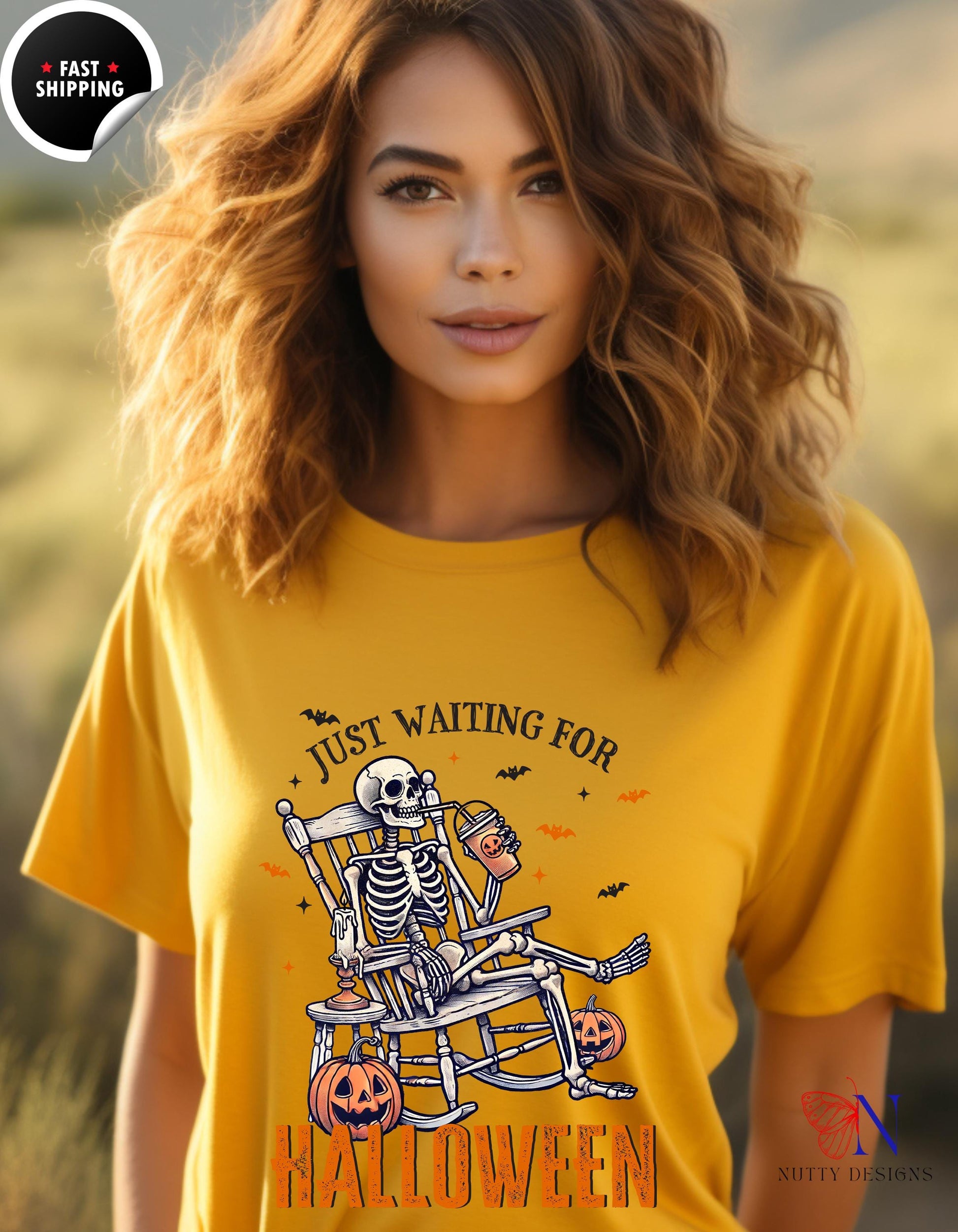 a woman wearing a yellow shirt with a skeleton on it