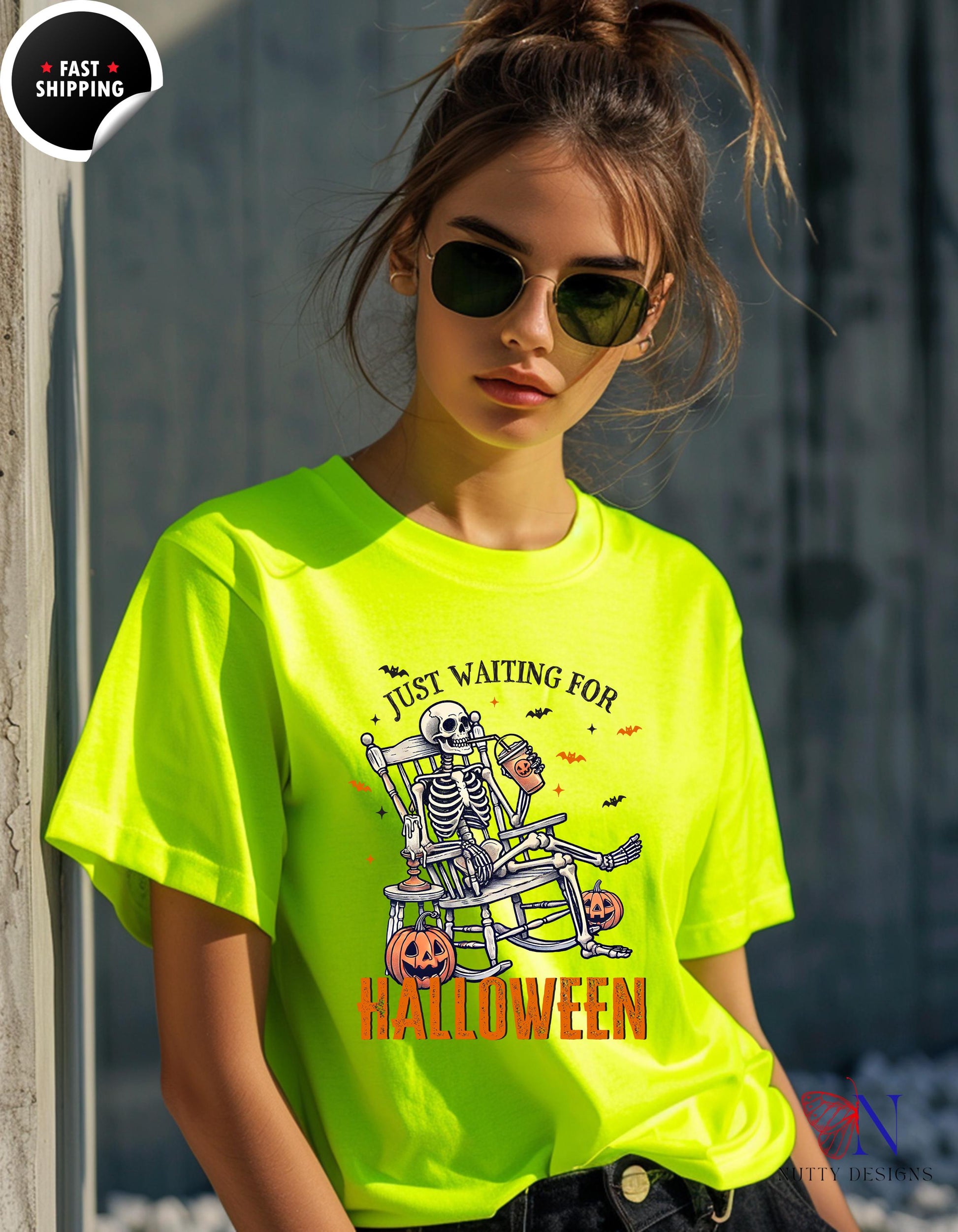 a woman wearing a neon yellow shirt with a skeleton on it