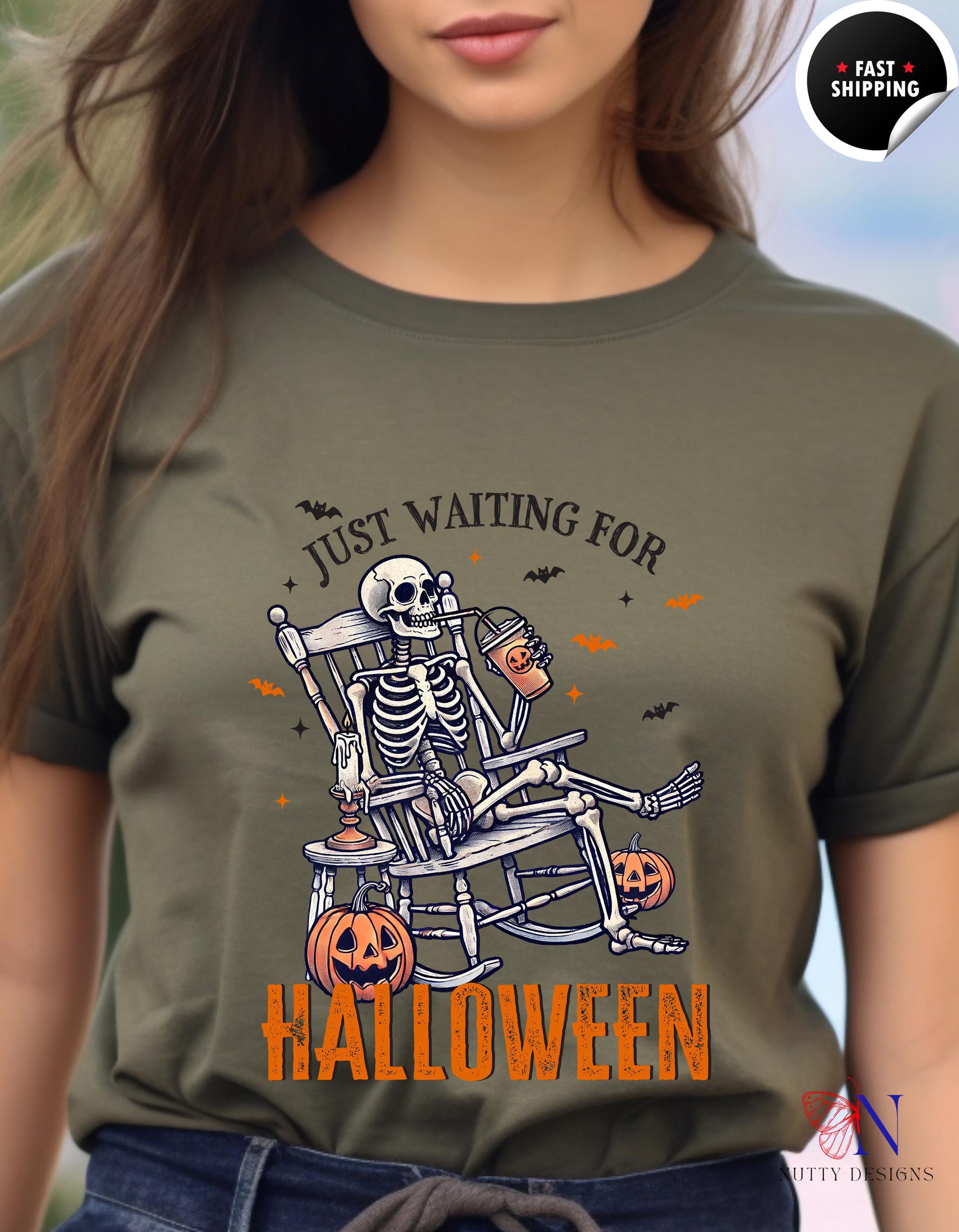 a woman wearing a green shirt with a skeleton on it