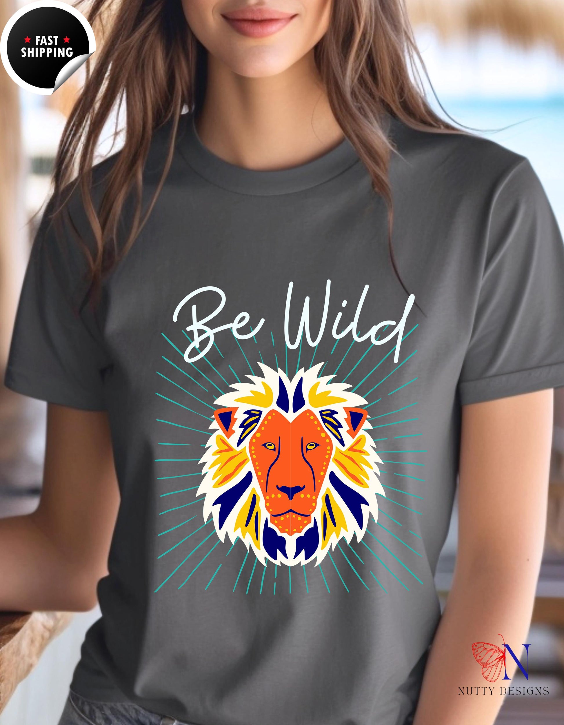 a woman wearing a t - shirt that says be wild