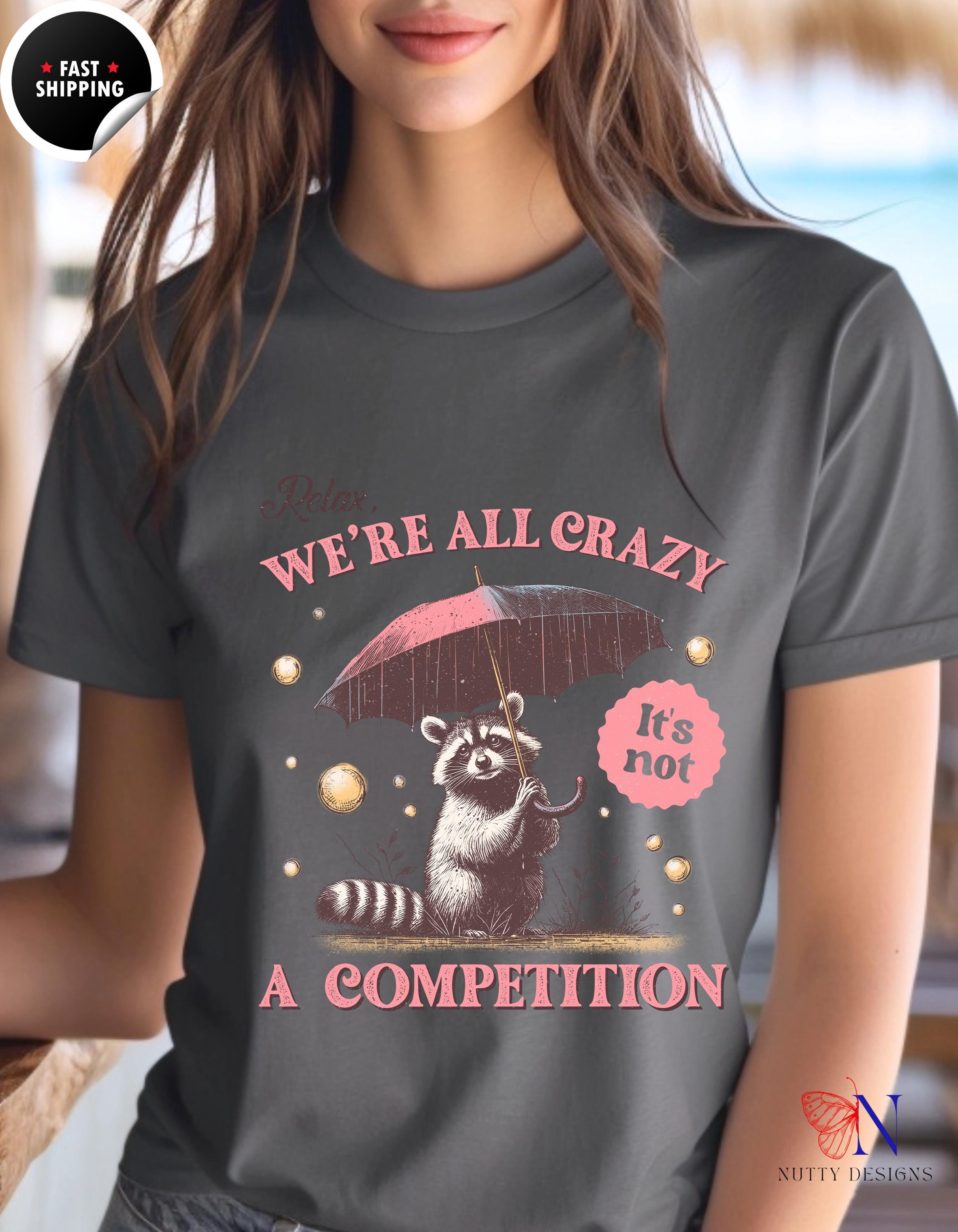 Relax We're All Crazy T-Shirt | Funny Racoon Graphic Tee | Humorous Quote Shirt | Casual Wear for Nature Lovers