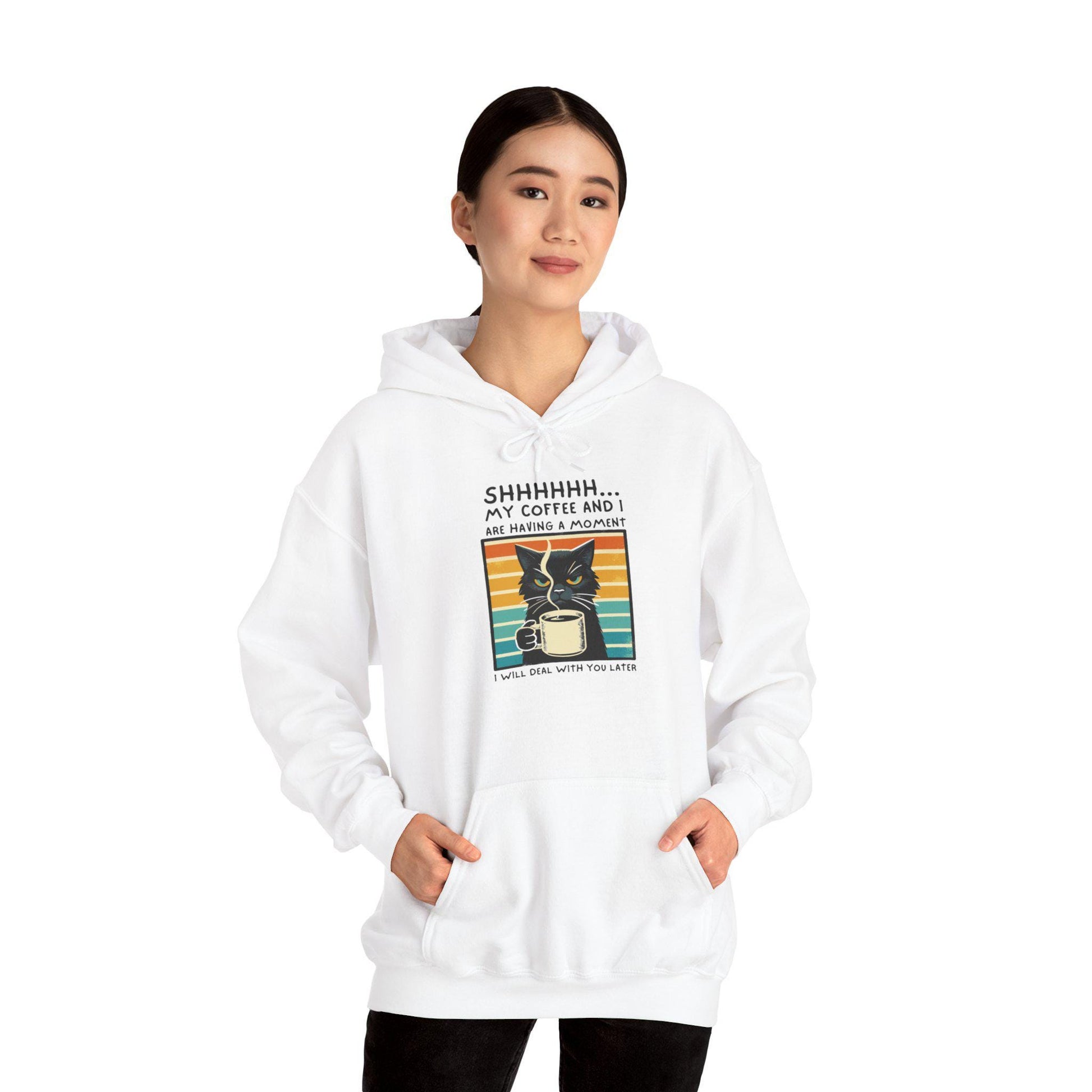 Unisex white hoodie with 'SHHHHHH My Coffee and I are having a moment' graphic, ideal for cozy comfort.