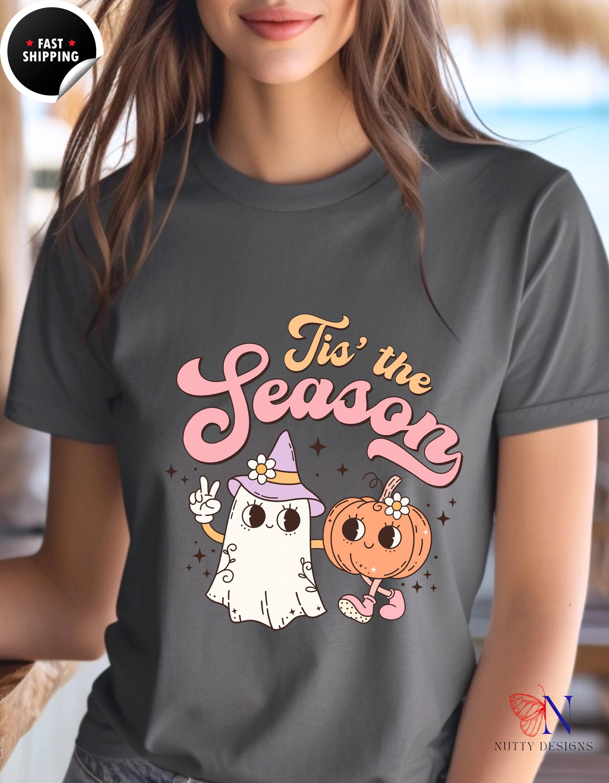 a woman wearing a t - shirt that says tis the season