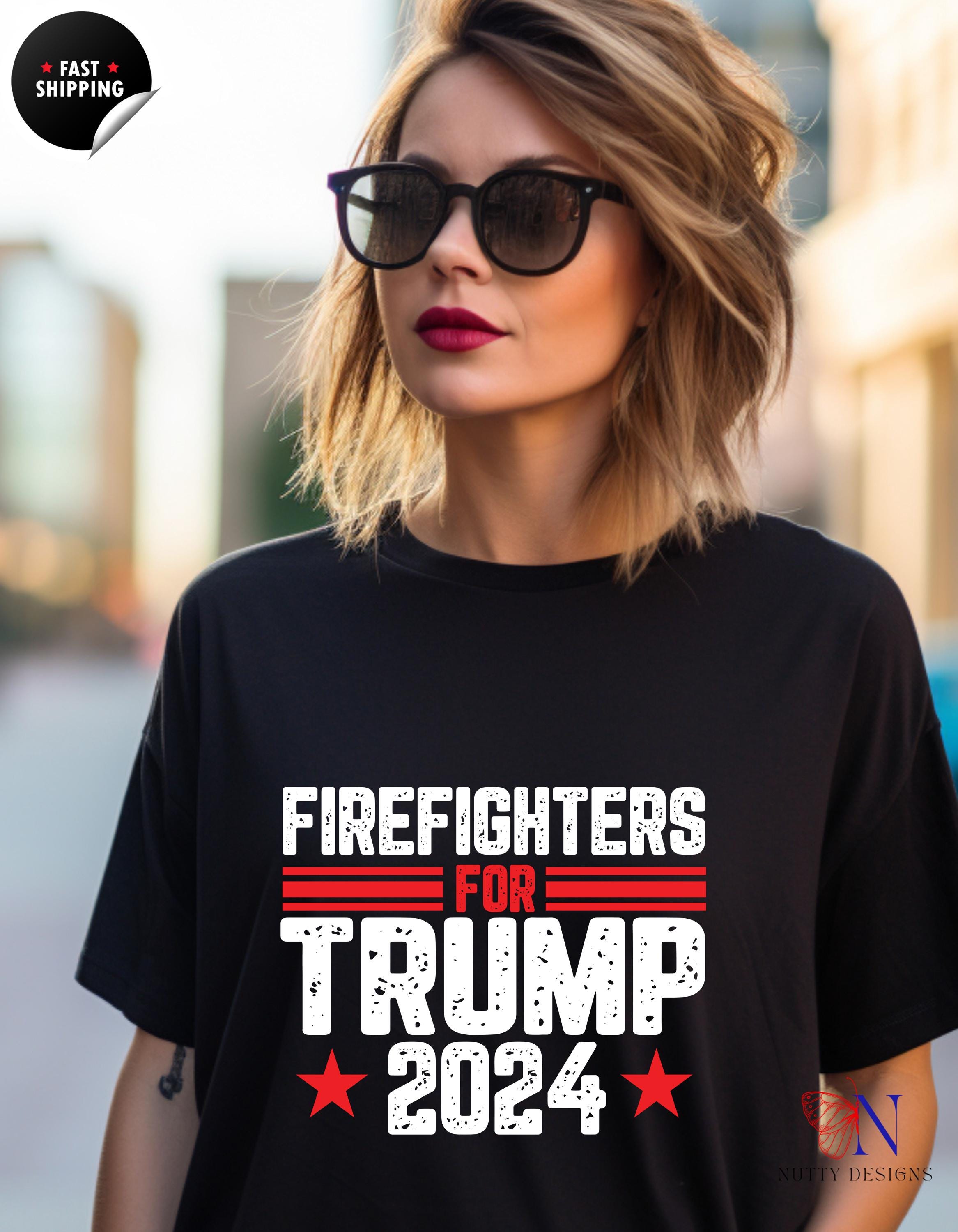 a woman wearing a t - shirt that says firefighters for trump 2012