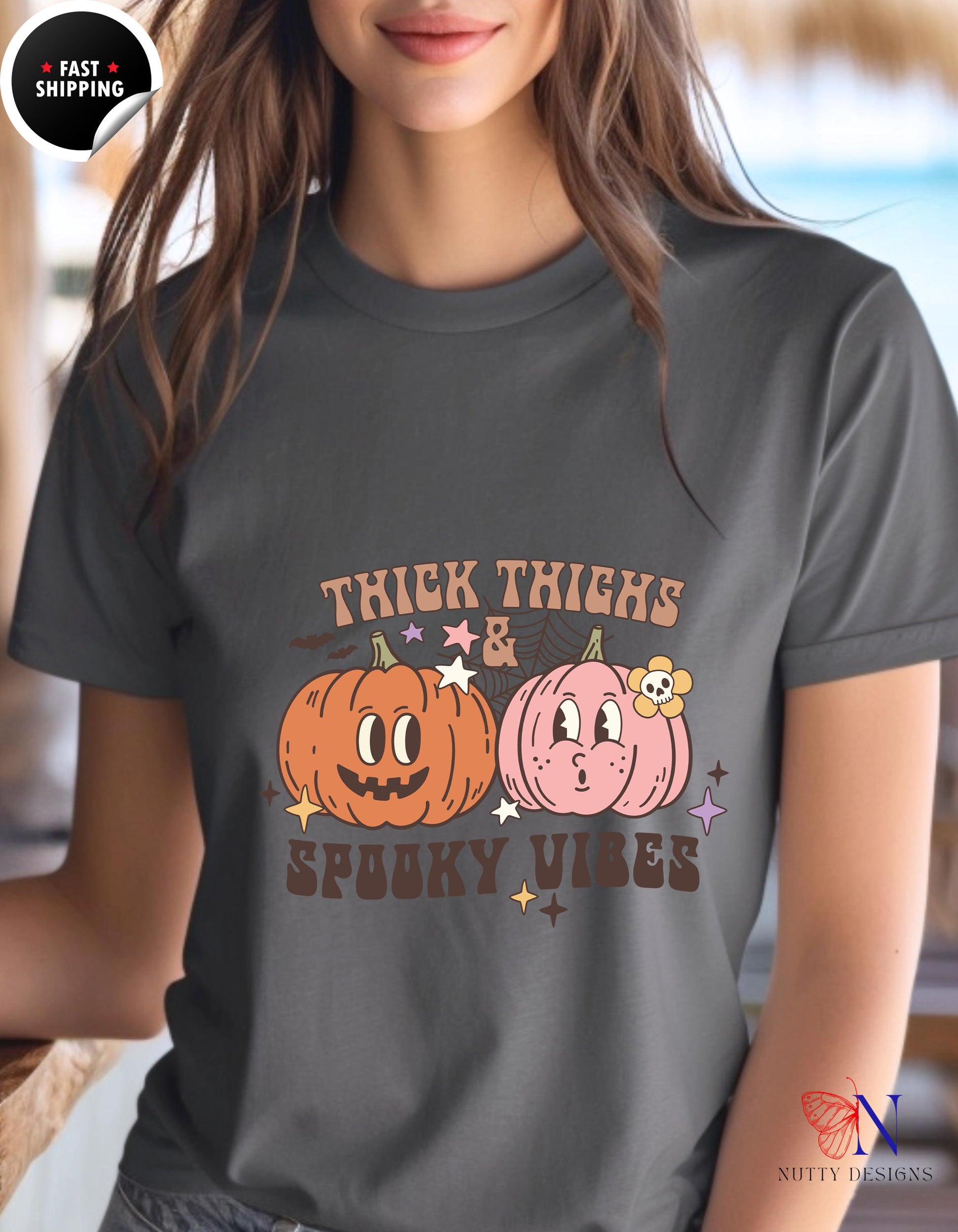 a woman wearing a t - shirt that says trick things and spooky vibe