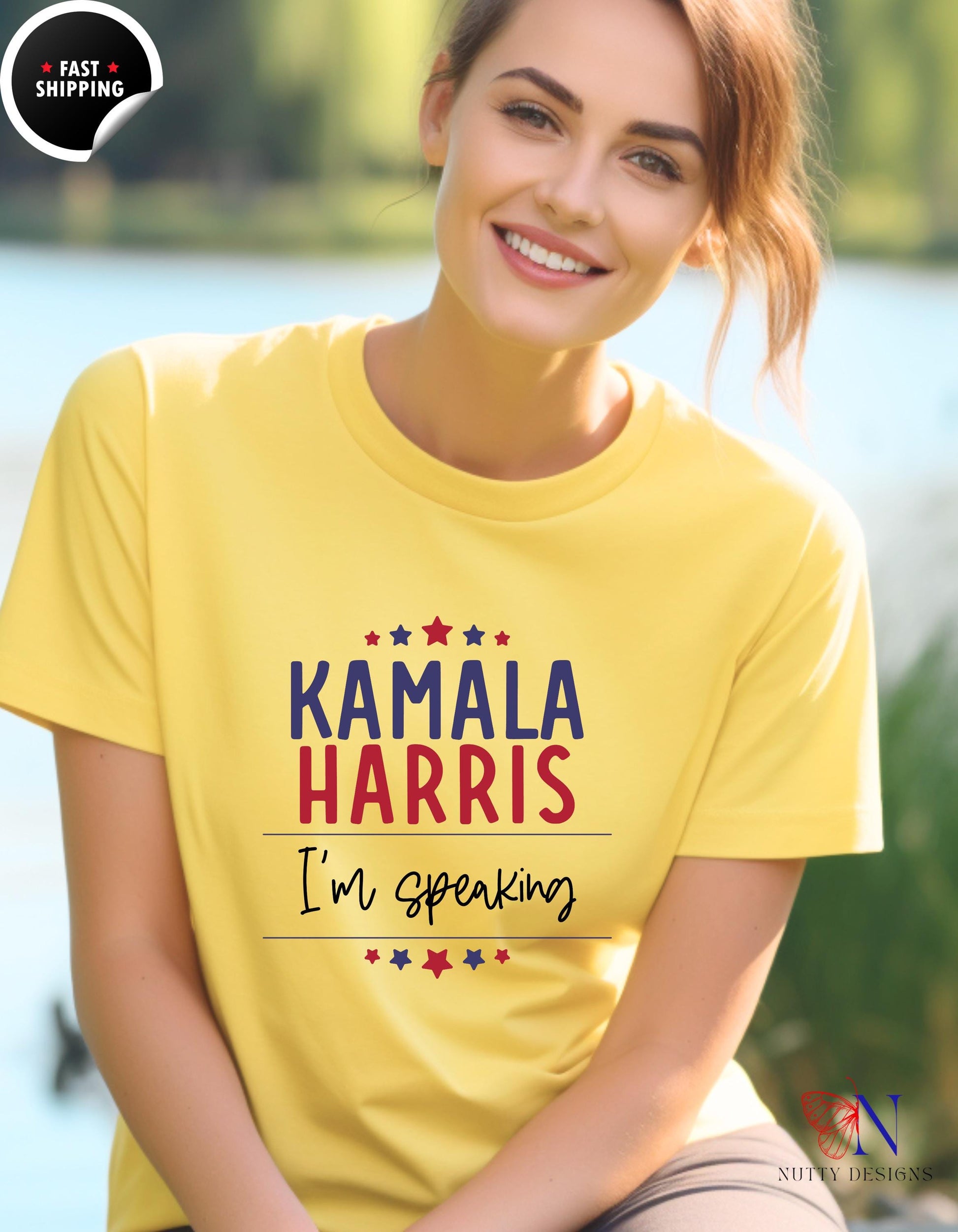 a woman wearing a yellow t - shirt that says kaala harris i