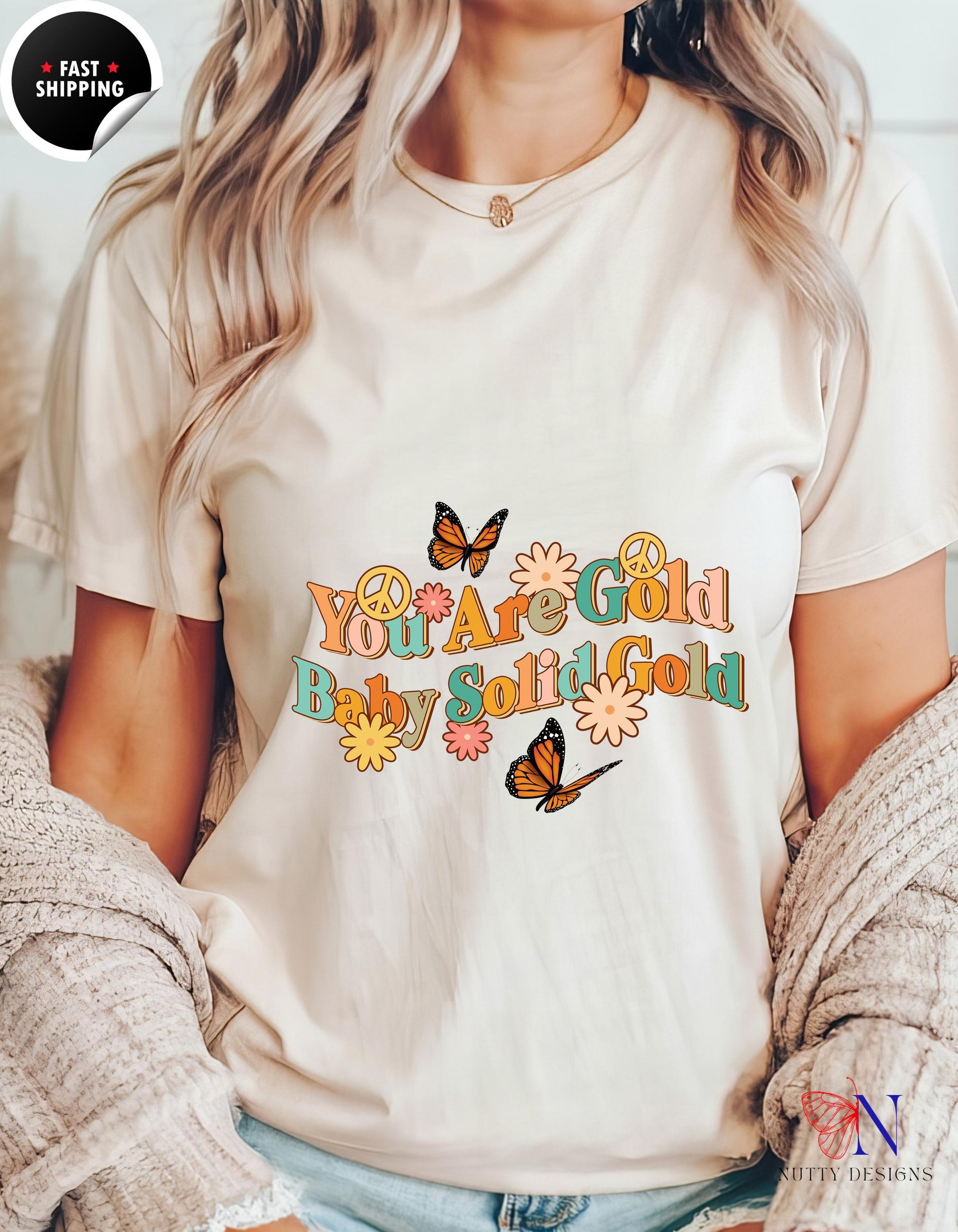 a woman wearing a t - shirt that says you are a girl, baby,