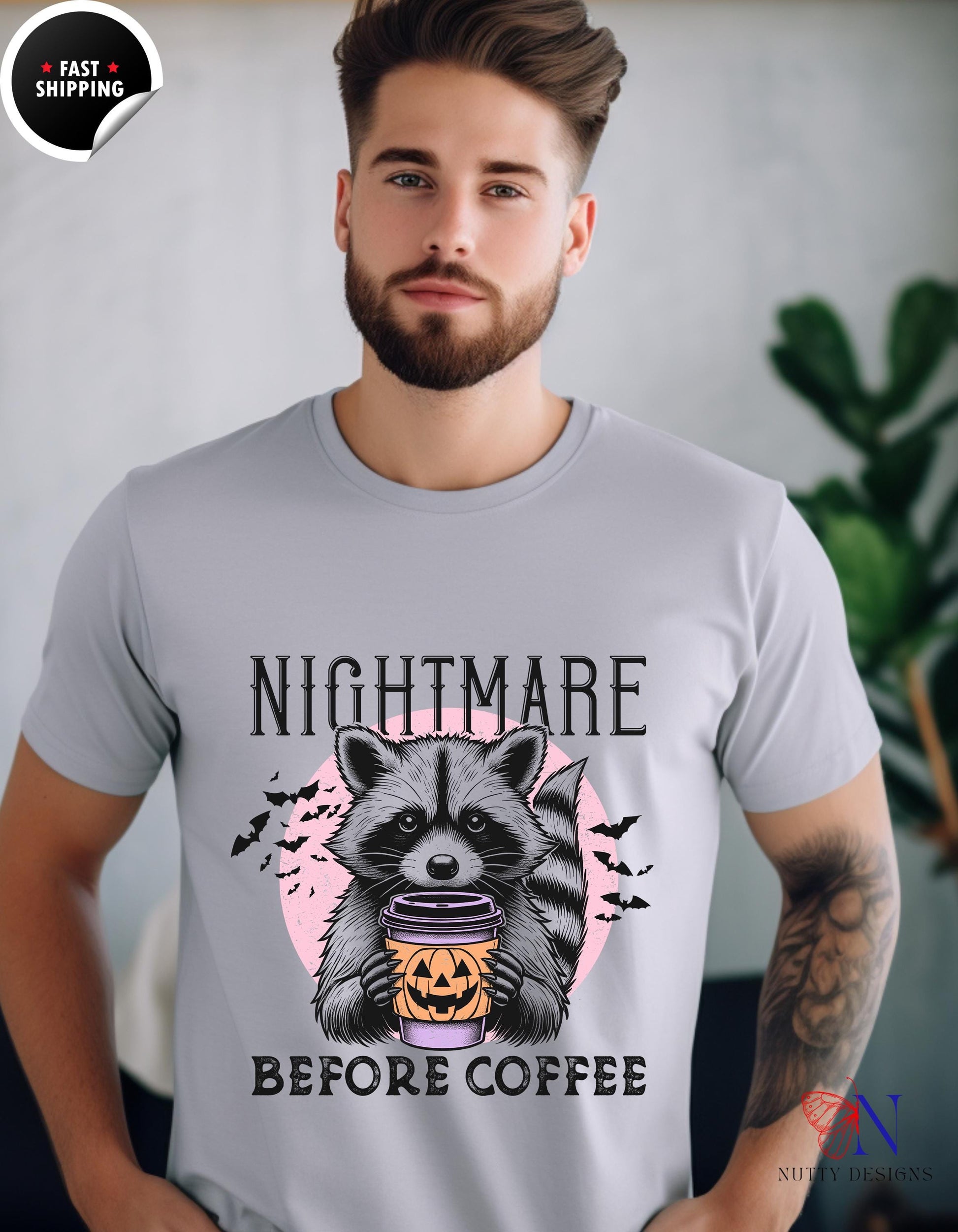 a man wearing a t - shirt that says nightmares before coffee