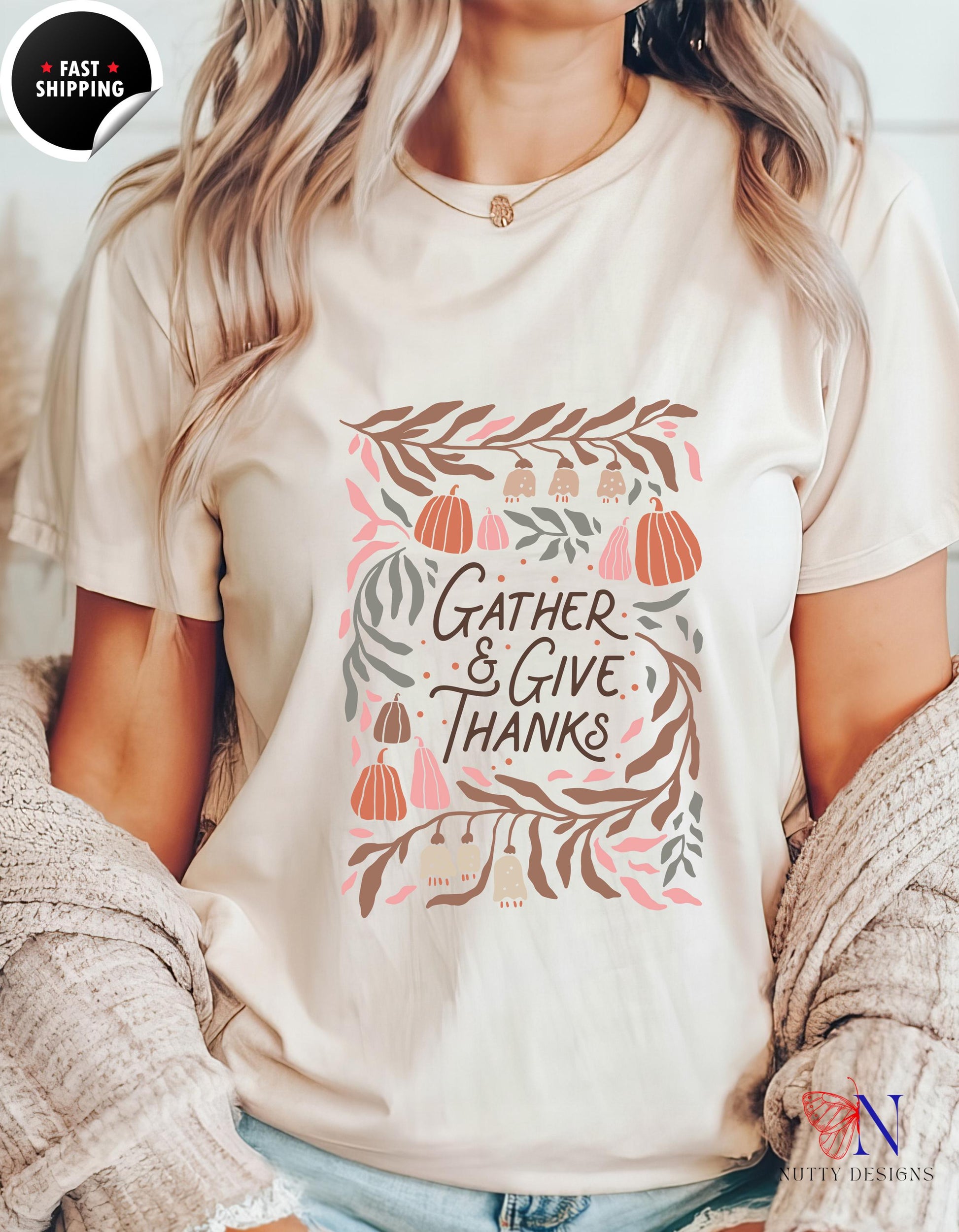 a woman wearing a t - shirt that says gather and give thanks