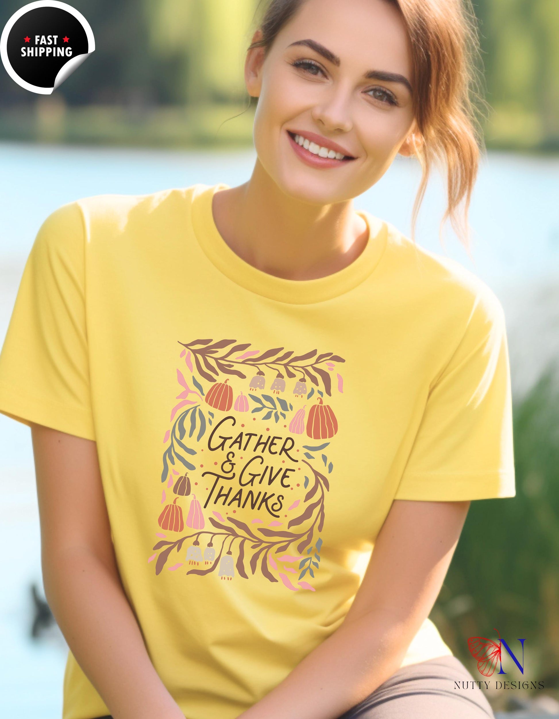 a woman wearing a t - shirt that says gather and give thanks