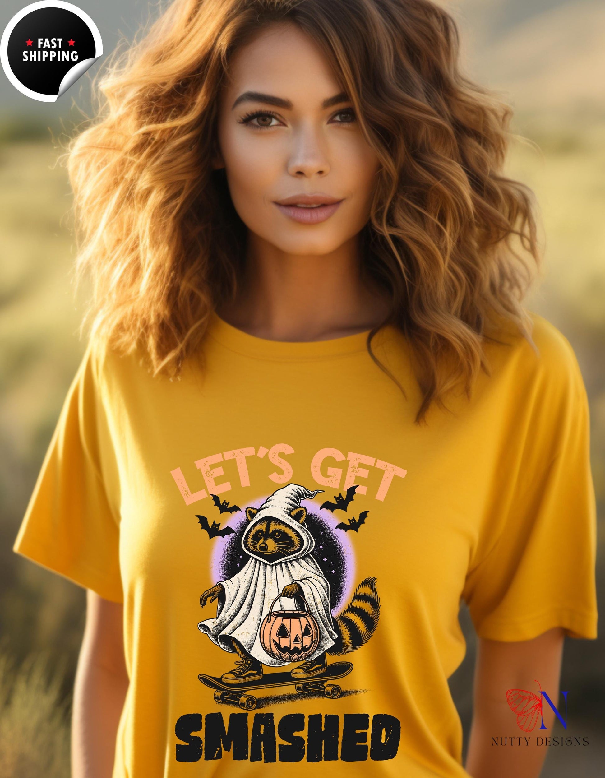 a woman wearing a yellow shirt with a ghost on it