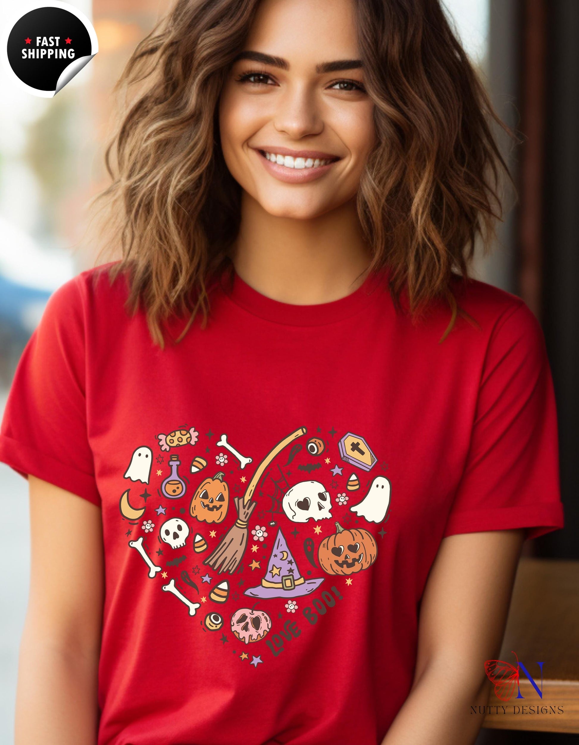 a woman wearing a red halloween t - shirt