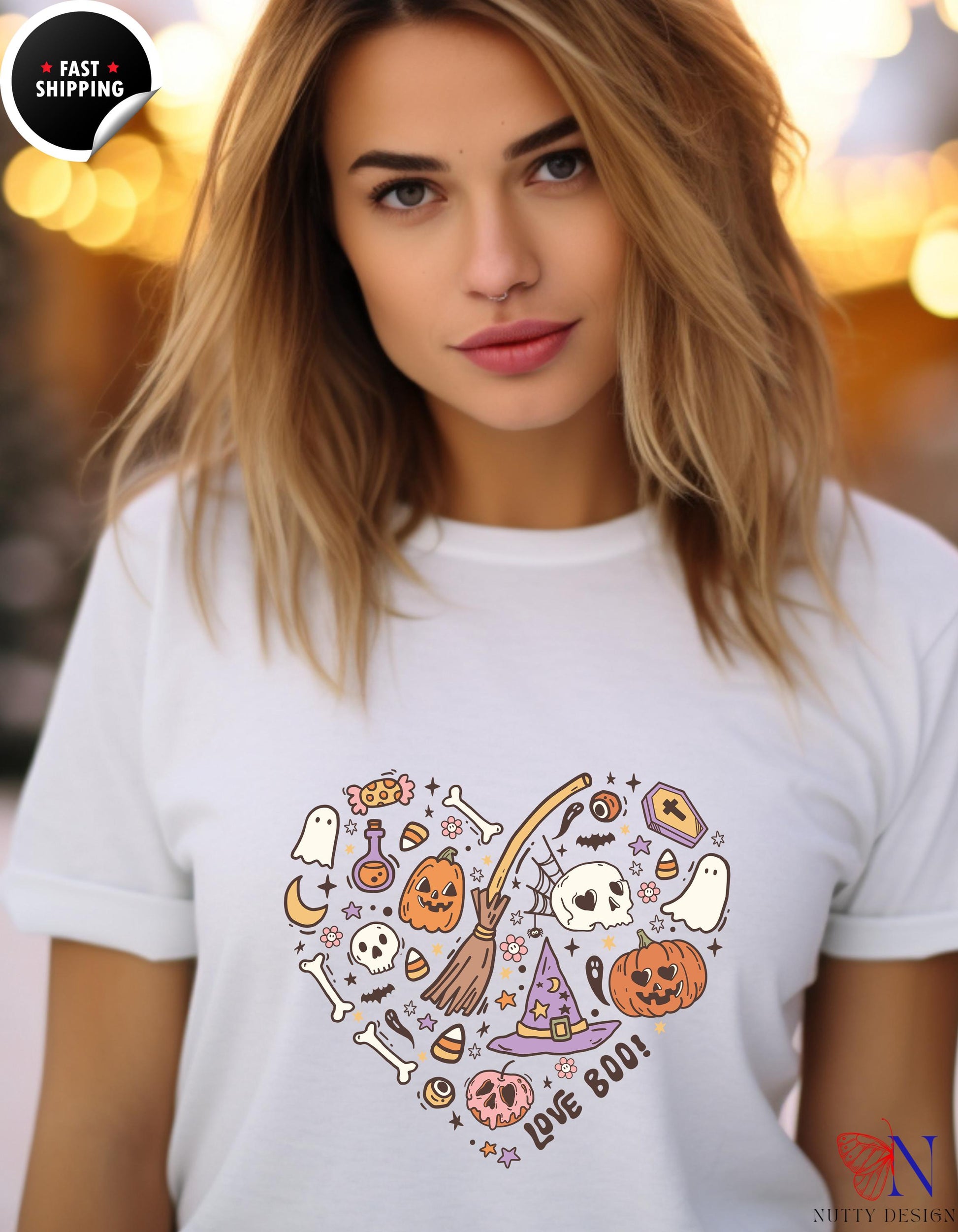 a woman wearing a white t - shirt with a heart shaped design