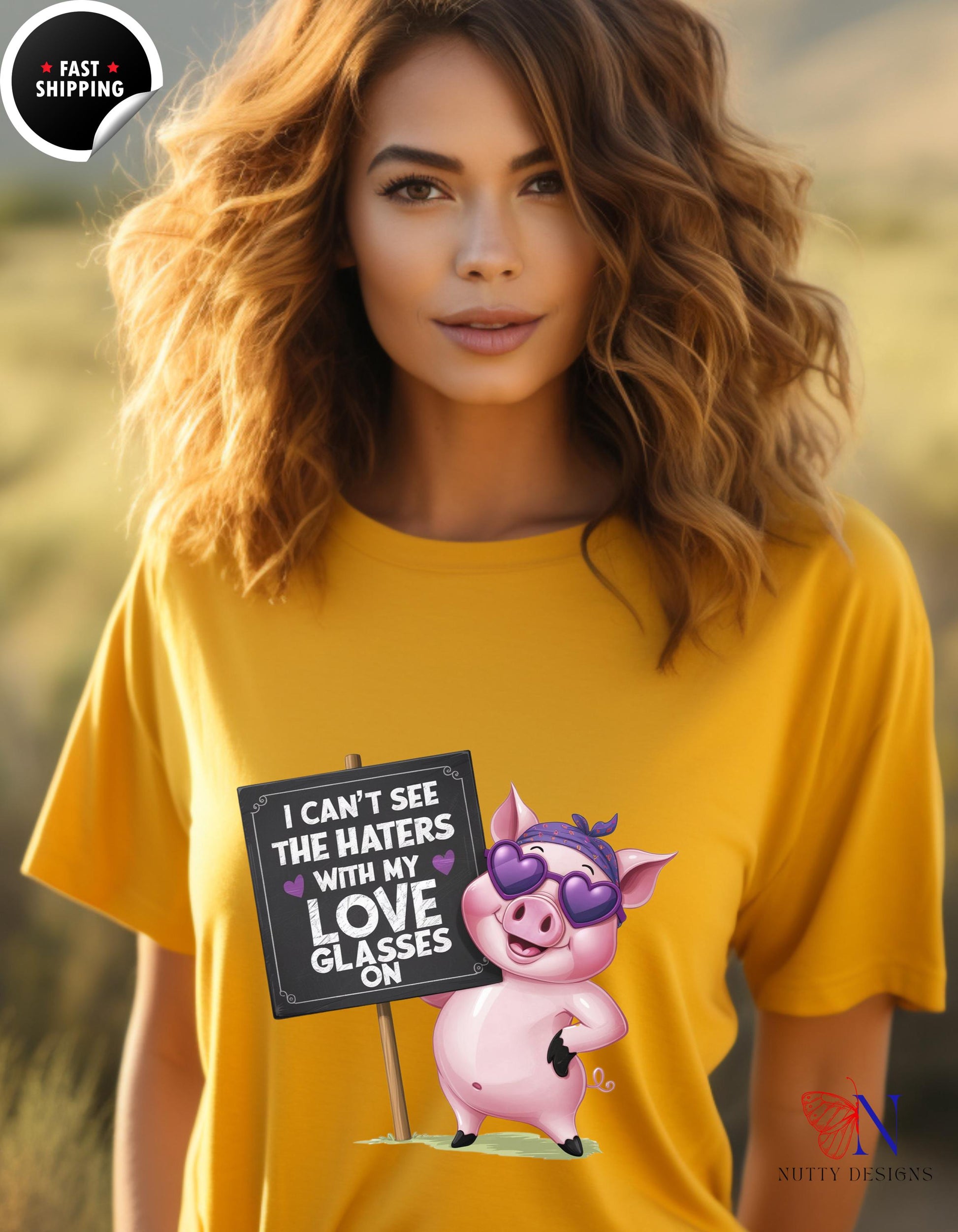 a woman in a yellow shirt holding a sign