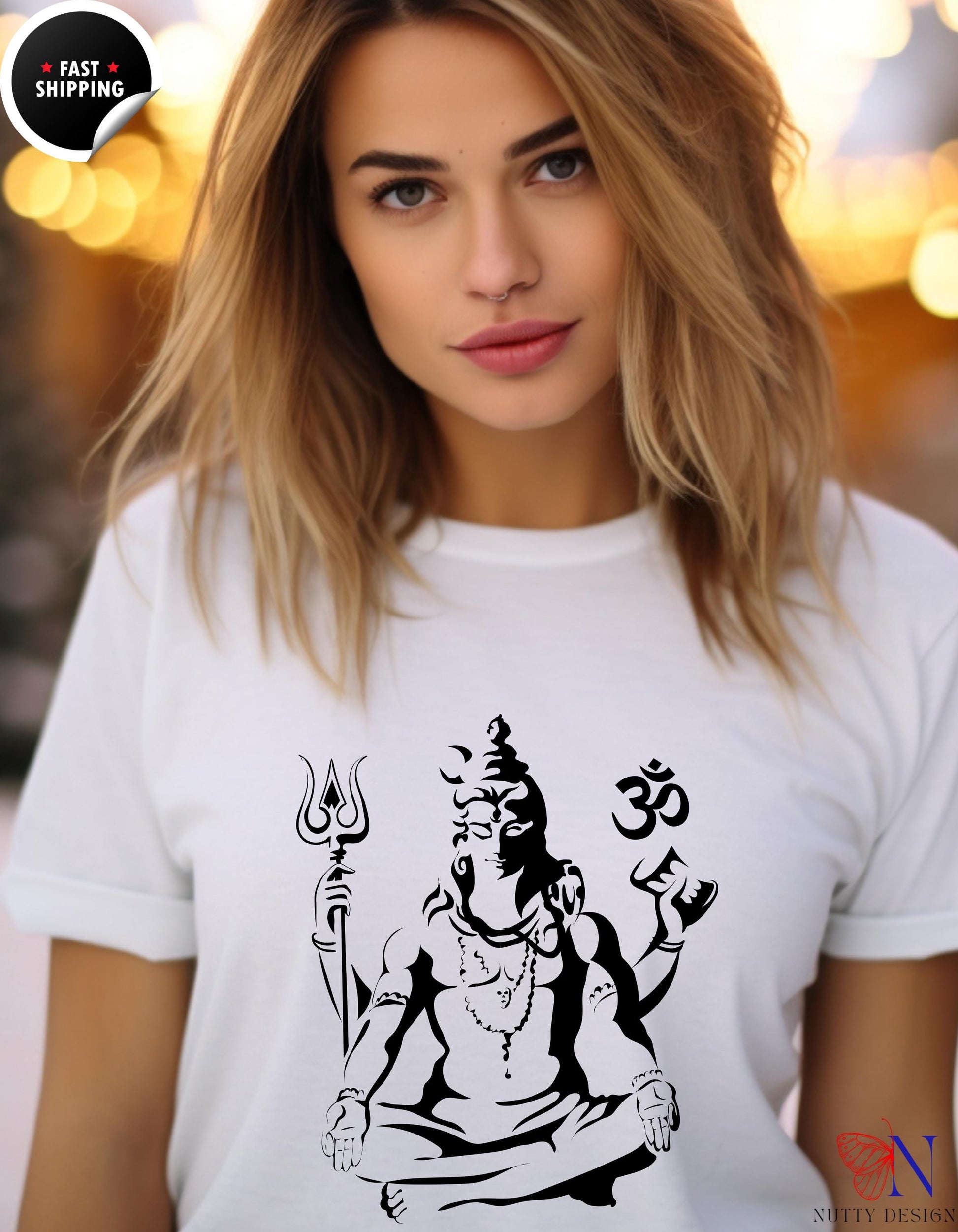 a woman wearing a t - shirt with an image of a hindu god on it