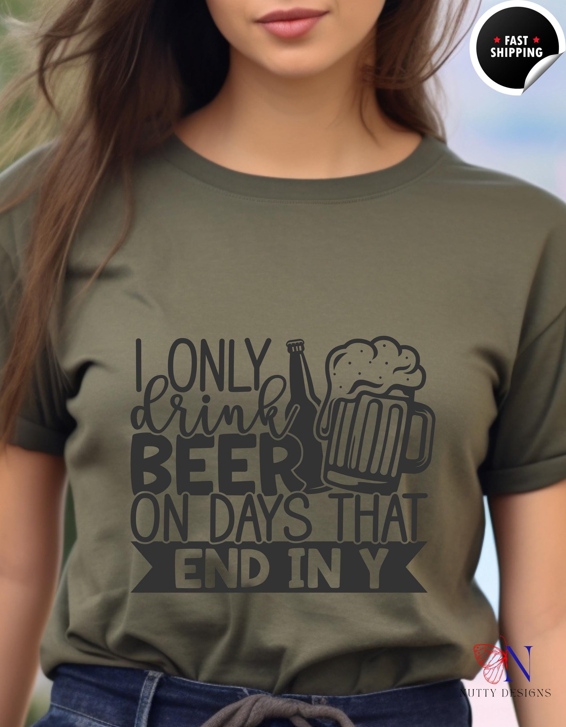 a woman wearing a t - shirt that says only drink beer on days that end