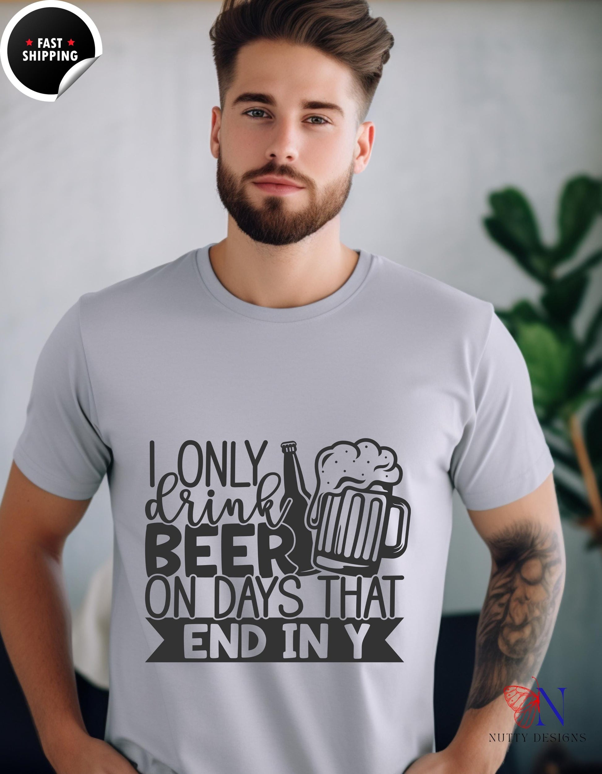 a man wearing a t - shirt that says only drink beer on days that end