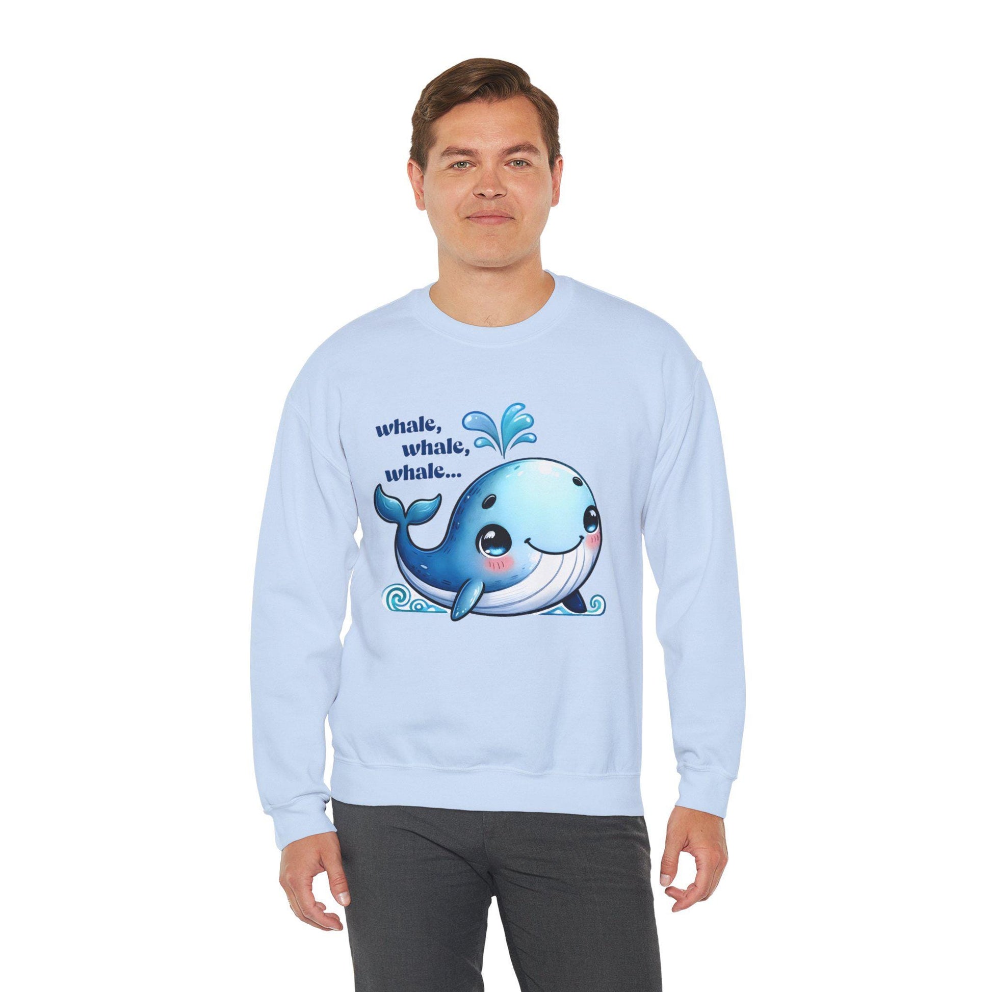 Cute whale graphic on a blue sweatshirt, perfect for animal lovers and pun enthusiasts.