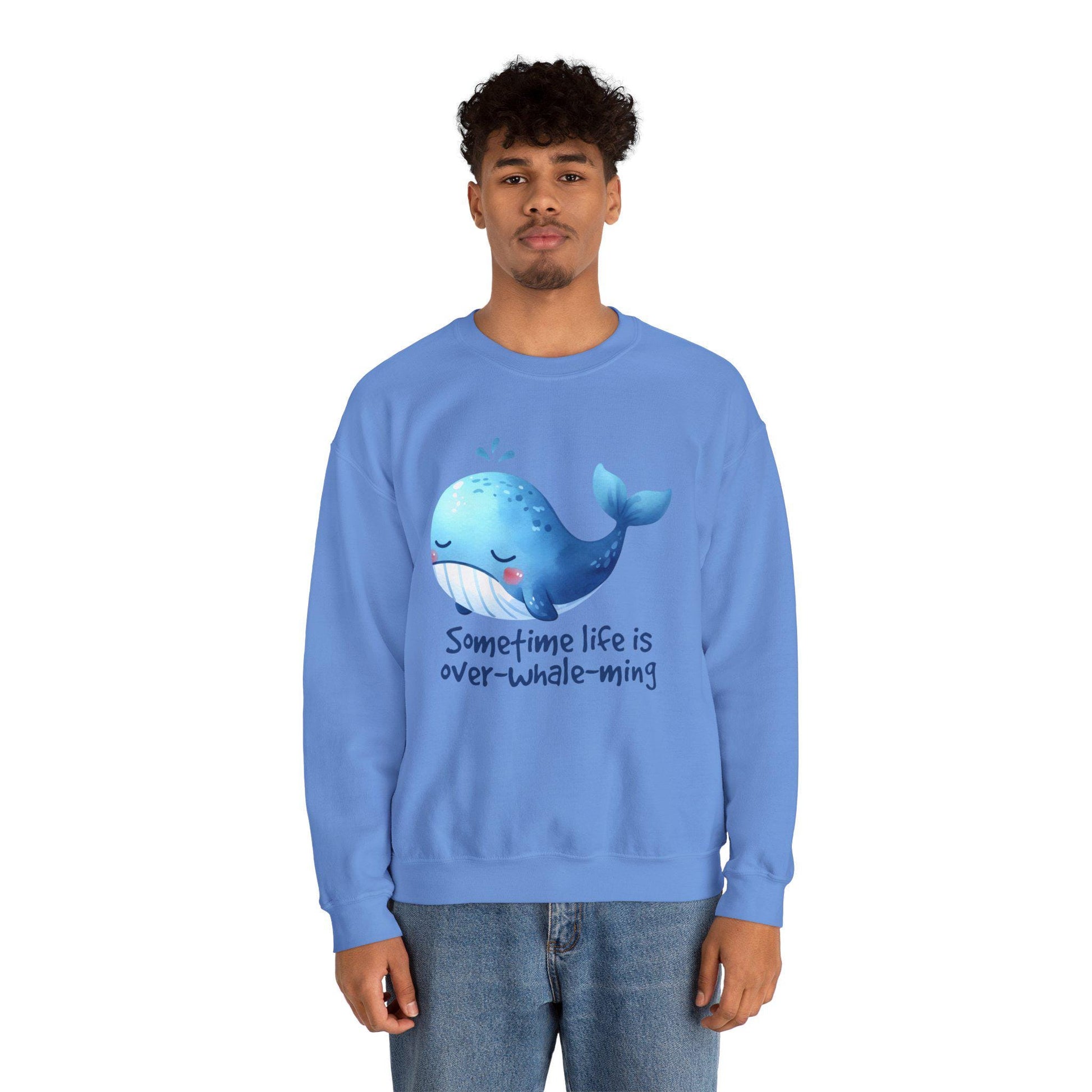 Sometime Life Is Over-Whale-ming positivity sweatshirt in blue featuring a cute whale graphic.