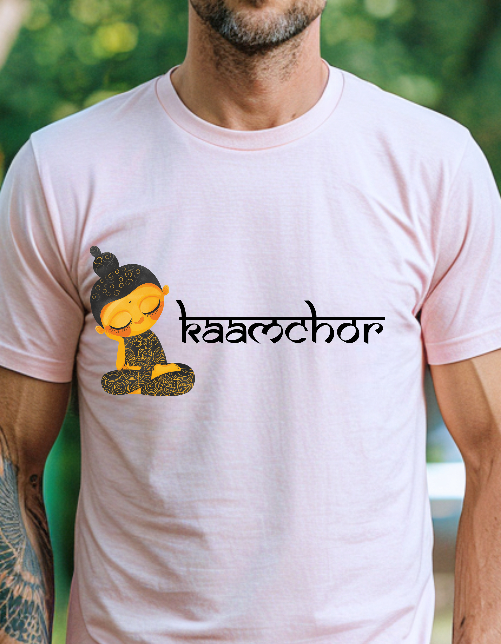a man with a tattoo on his arm wearing a t - shirt with a cartoon