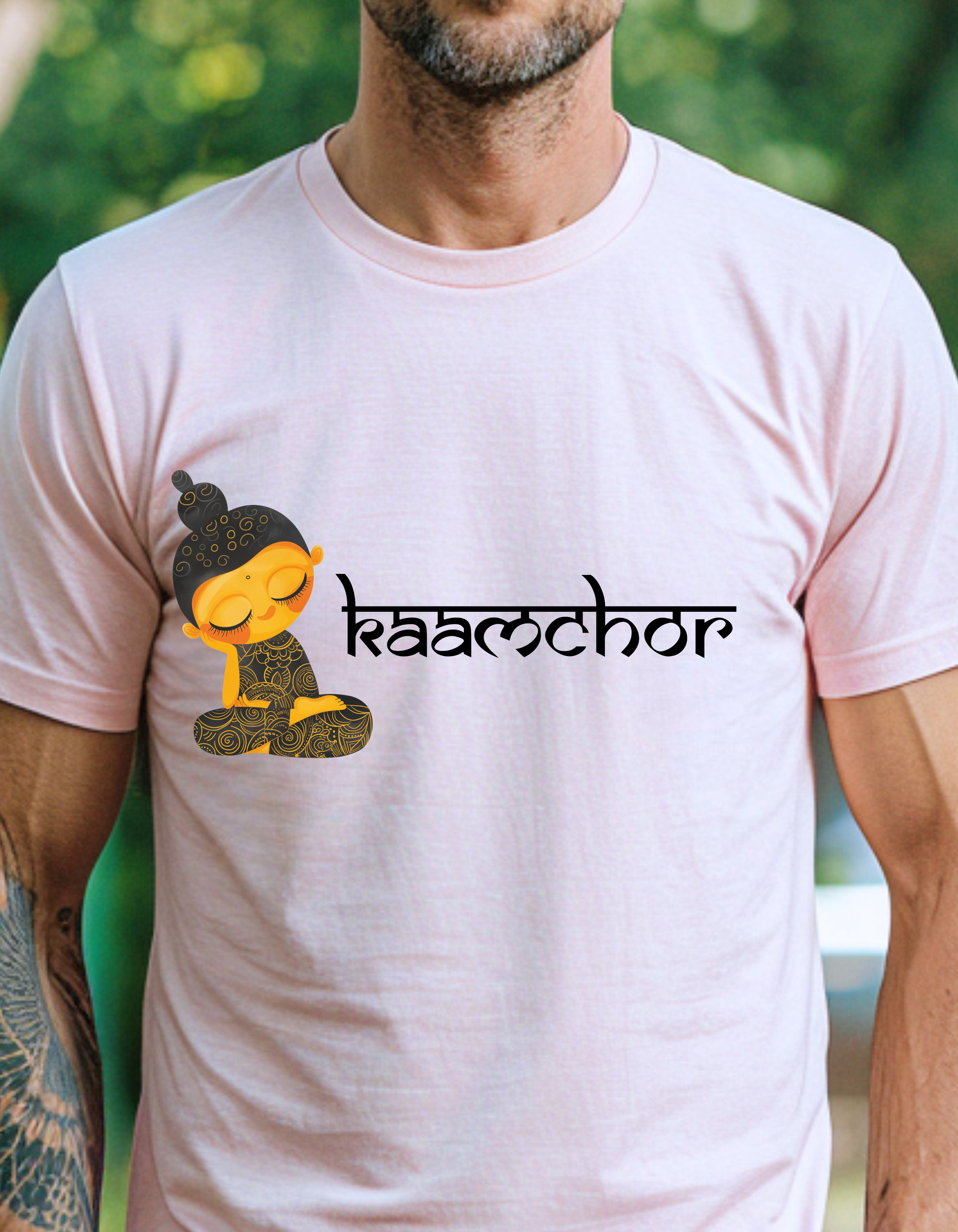 a man with a tattoo on his arm wearing a t - shirt with a cartoon