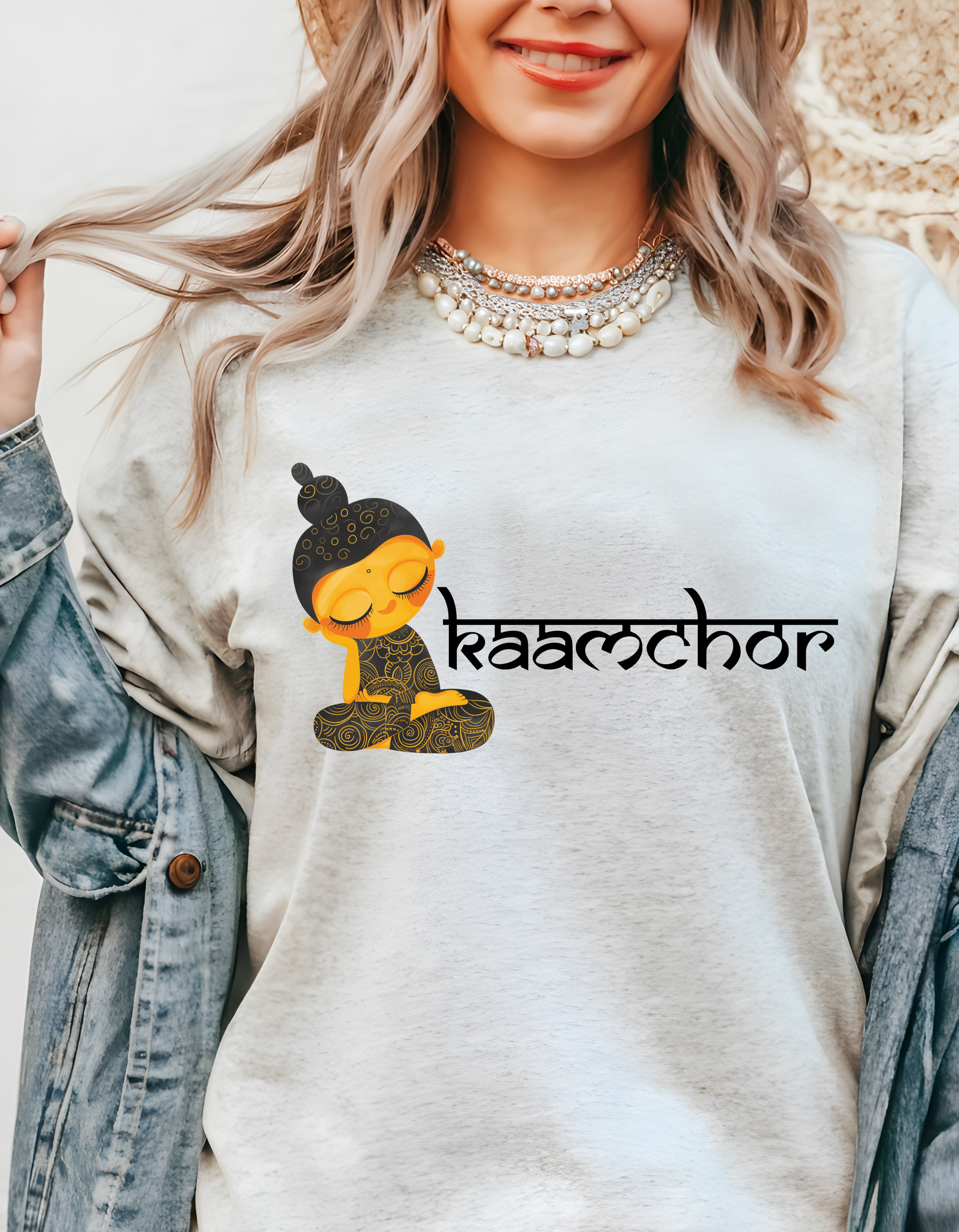 a woman wearing a t - shirt with a cartoon character on it