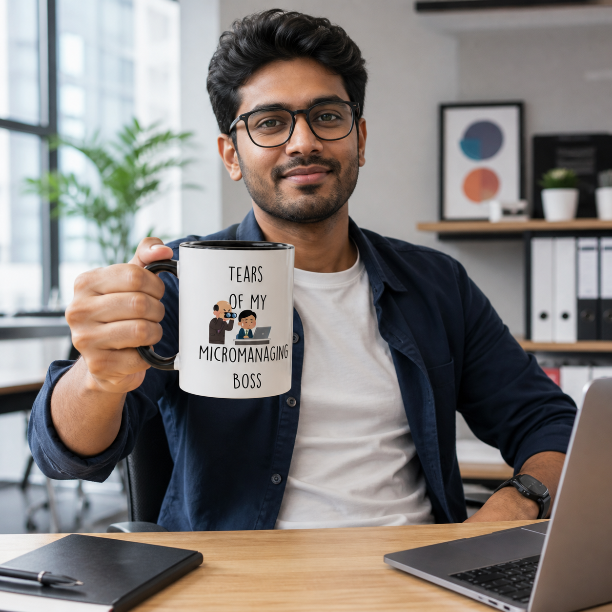 Young professional holding black-accent Tears of My Micromanaging Boss mug